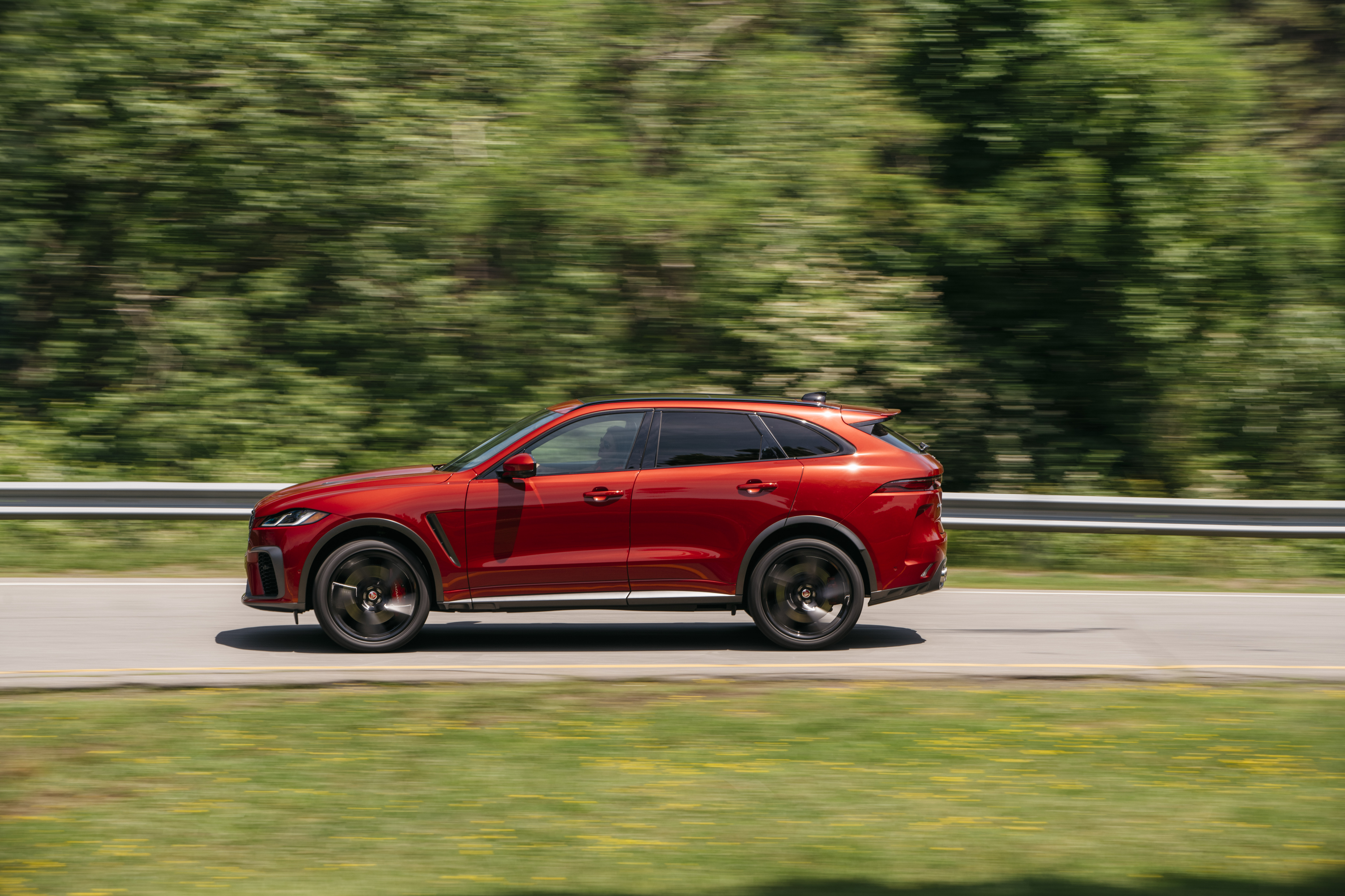 Red Jaguar F-Pace SVR SUV driving on road HD Wallpaper
