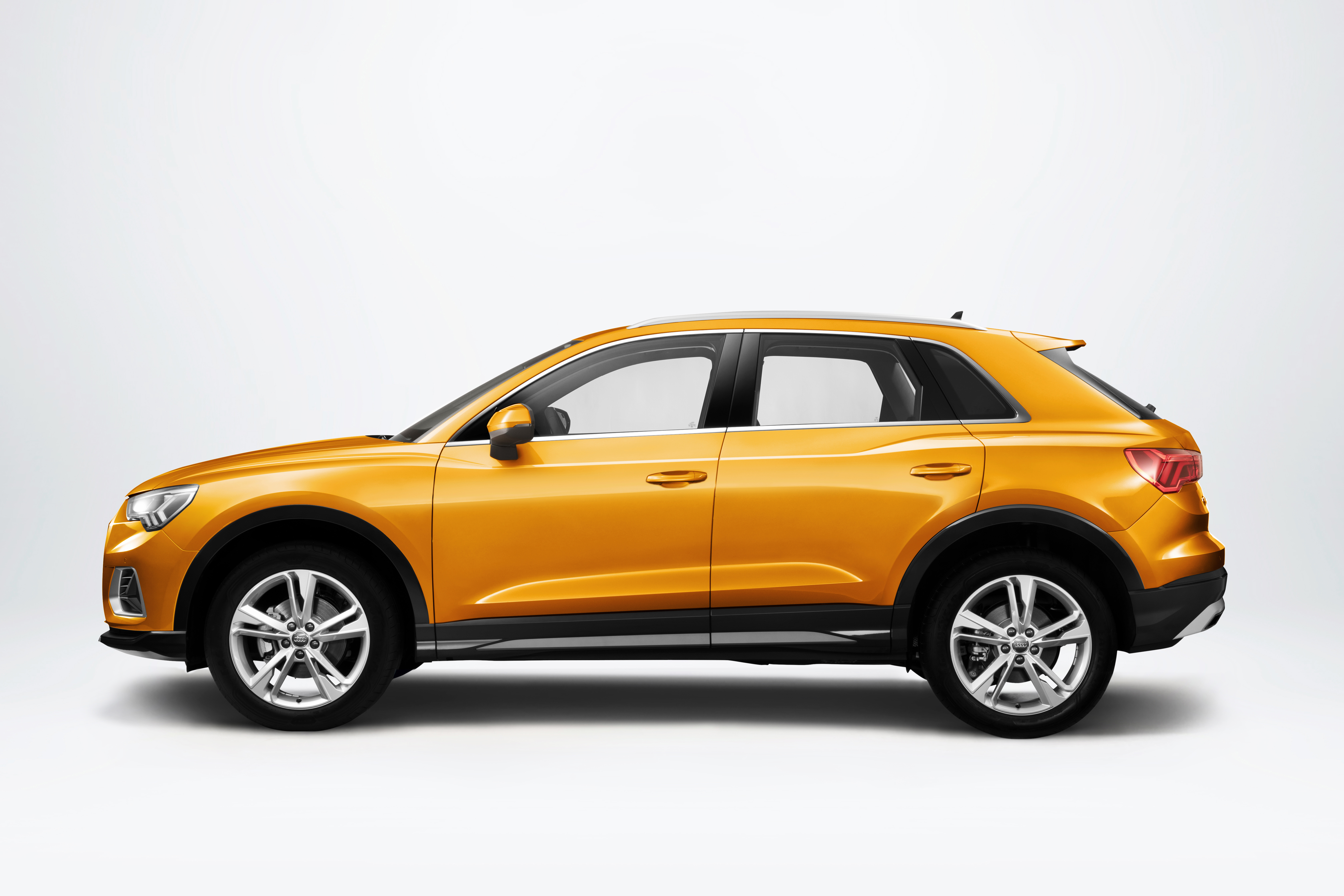 Orange Audi Q3 35 TFSI SUV side view HD Wallpaper