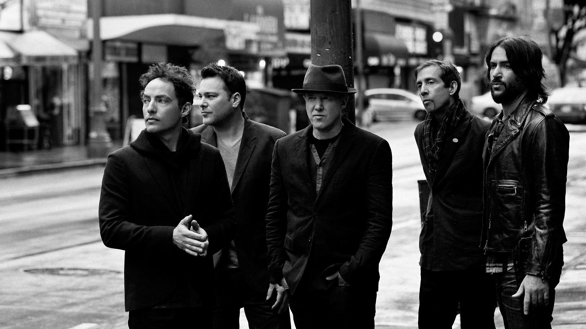 The Wallflowers band portrait on a city street HD Wallpaper