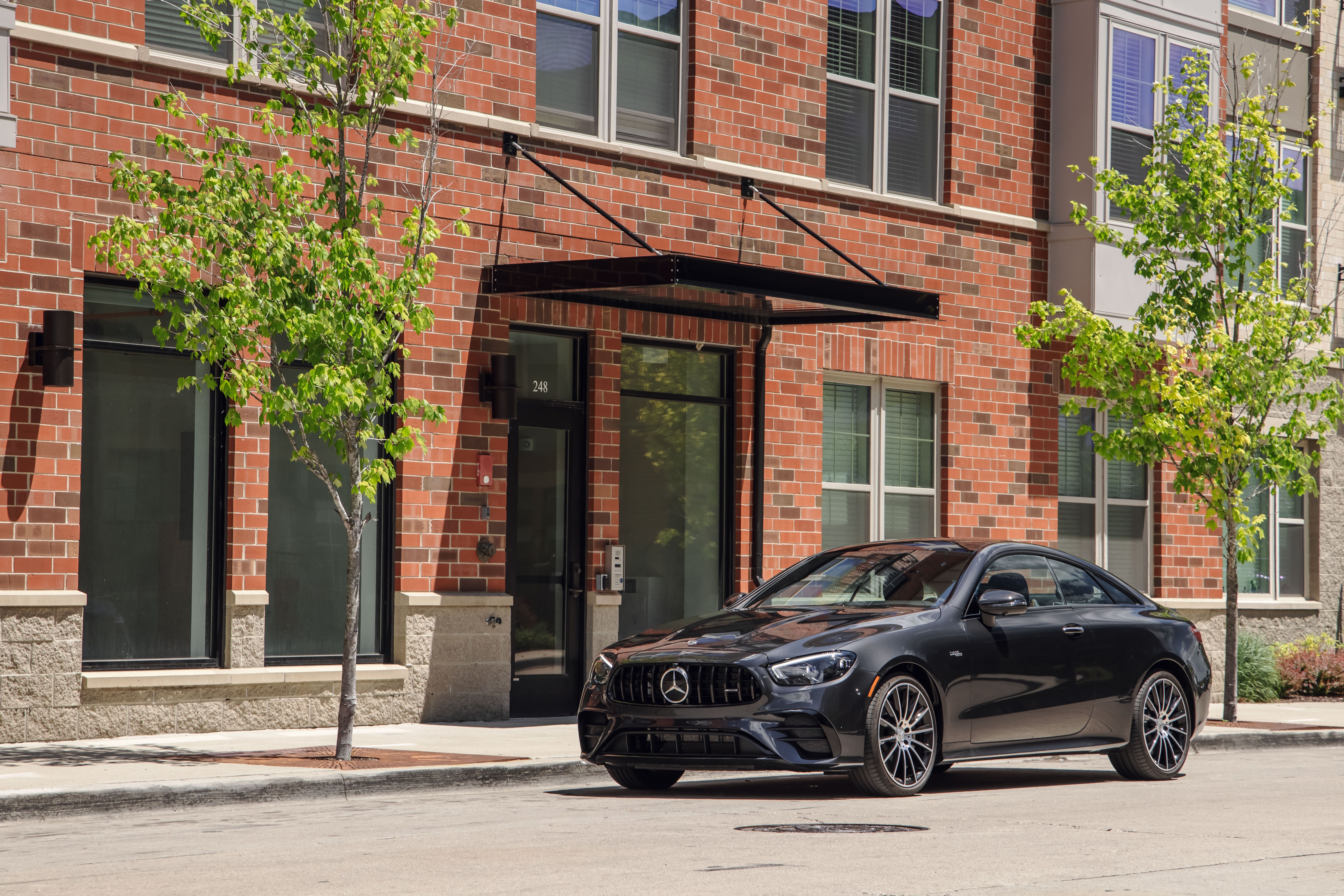 Black Mercedes-AMG E 53 Coupé parked on street HD Wallpaper
