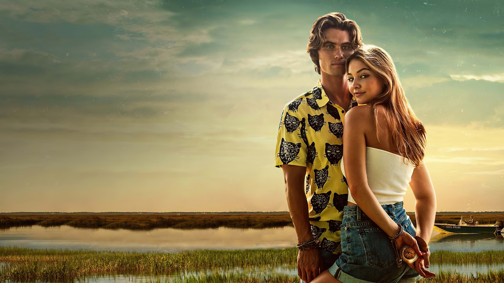 Madelyn Cline and Chase Stokes in a marsh HD Wallpaper