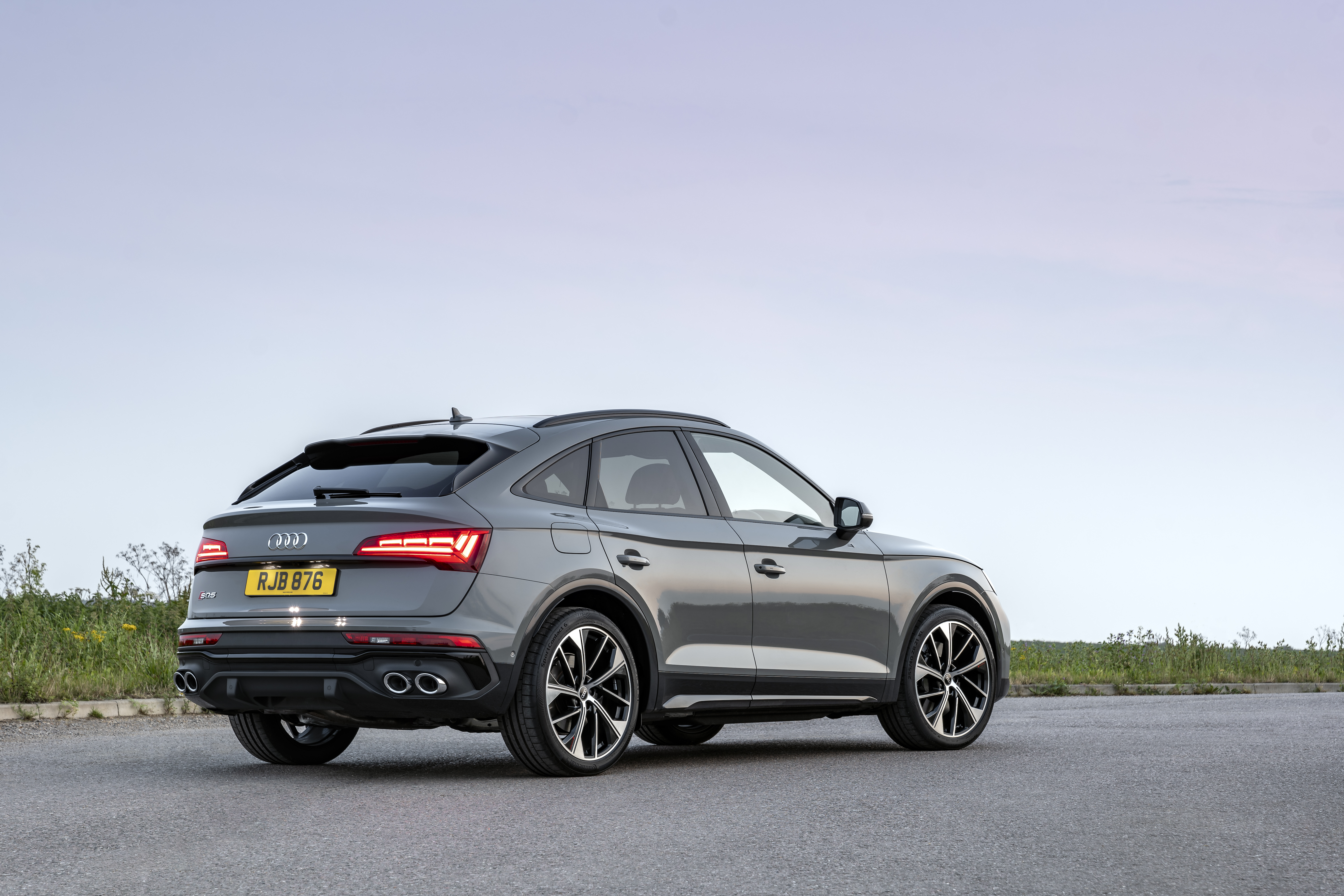 Grey Audi SQ5 Sportback TDI SUV parked on road HD Wallpaper