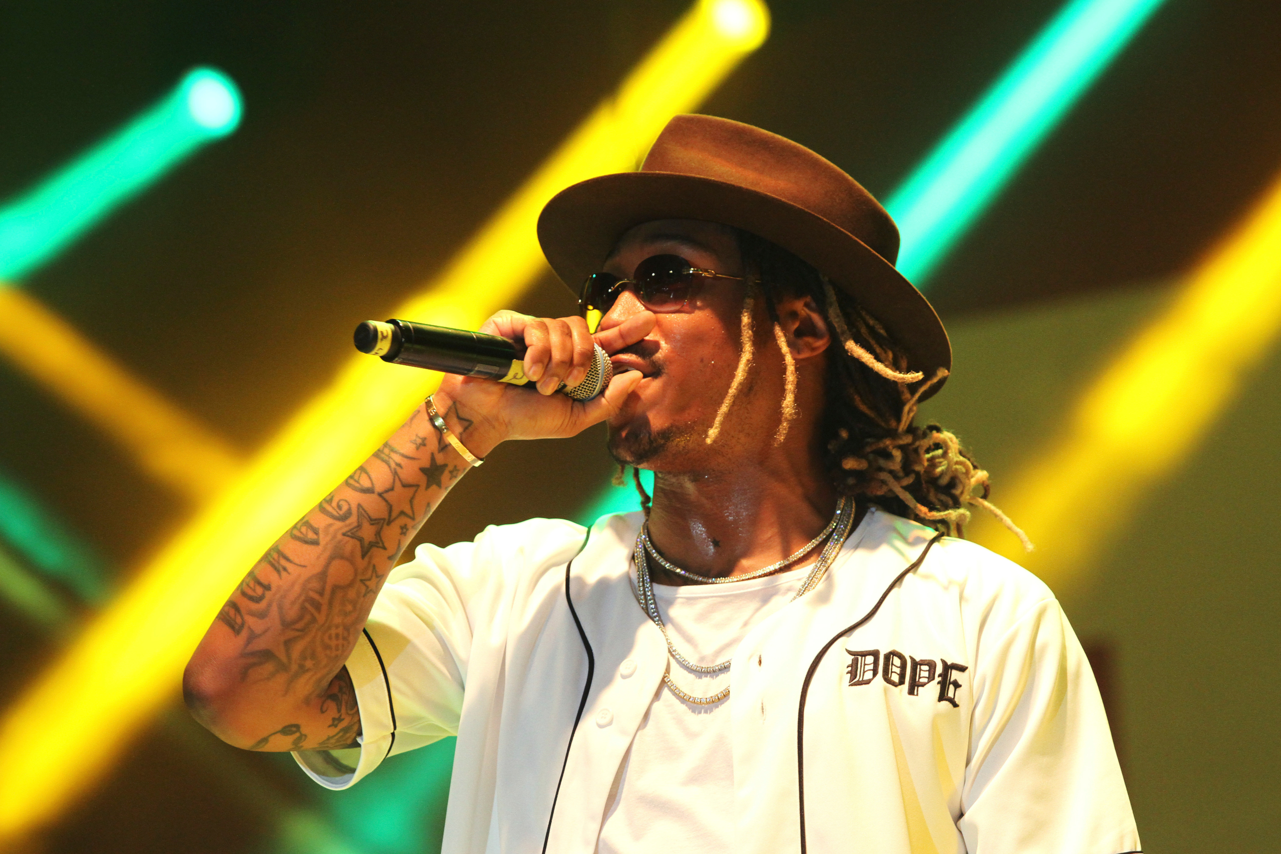 Rapper Future on Stage with Microphone HD Wallpaper