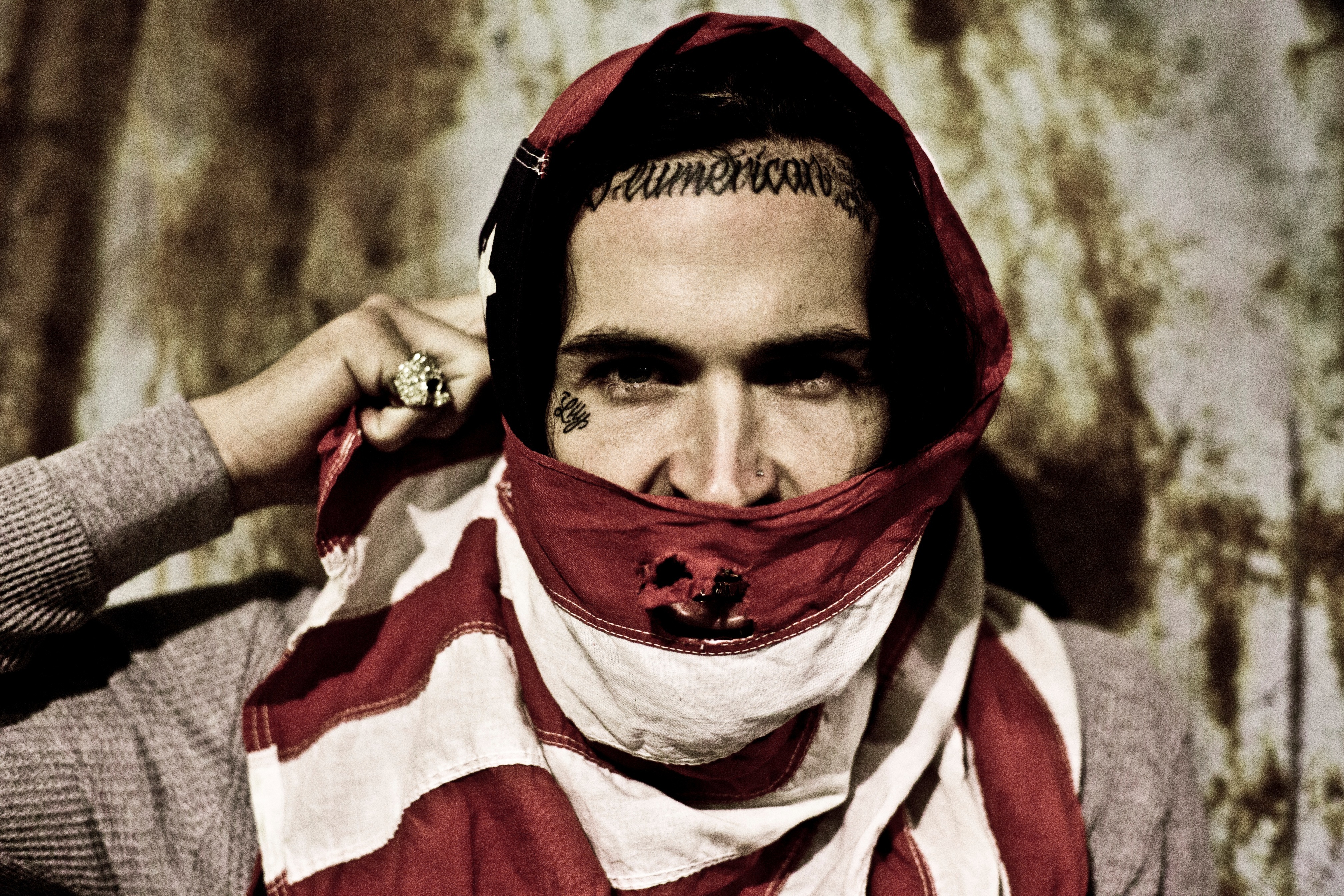 Yelawolf, American rapper, with flag scarf and face tattoos HD Wallpaper