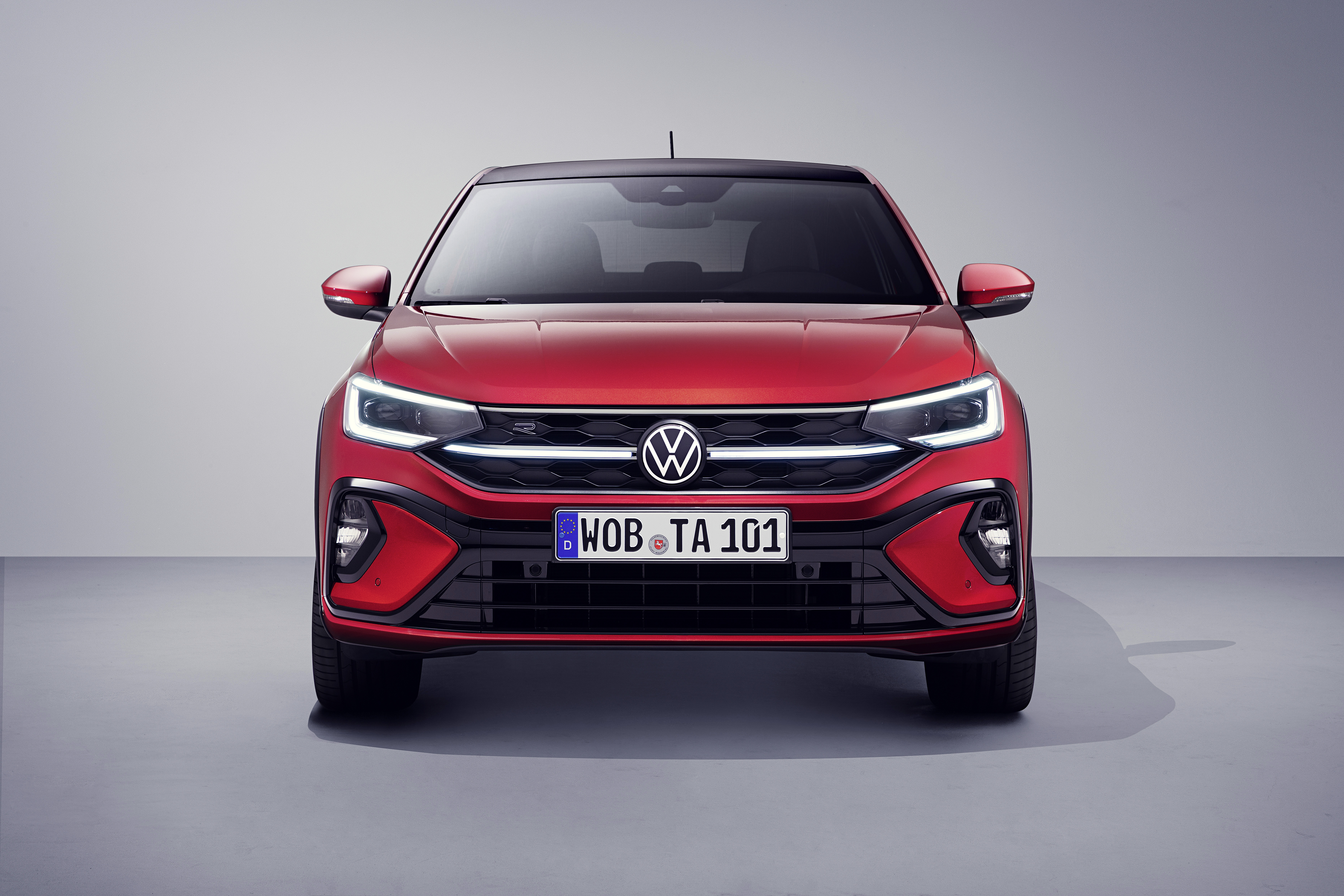 Red Volkswagen Taigo R-Line SUV front view HD Wallpaper