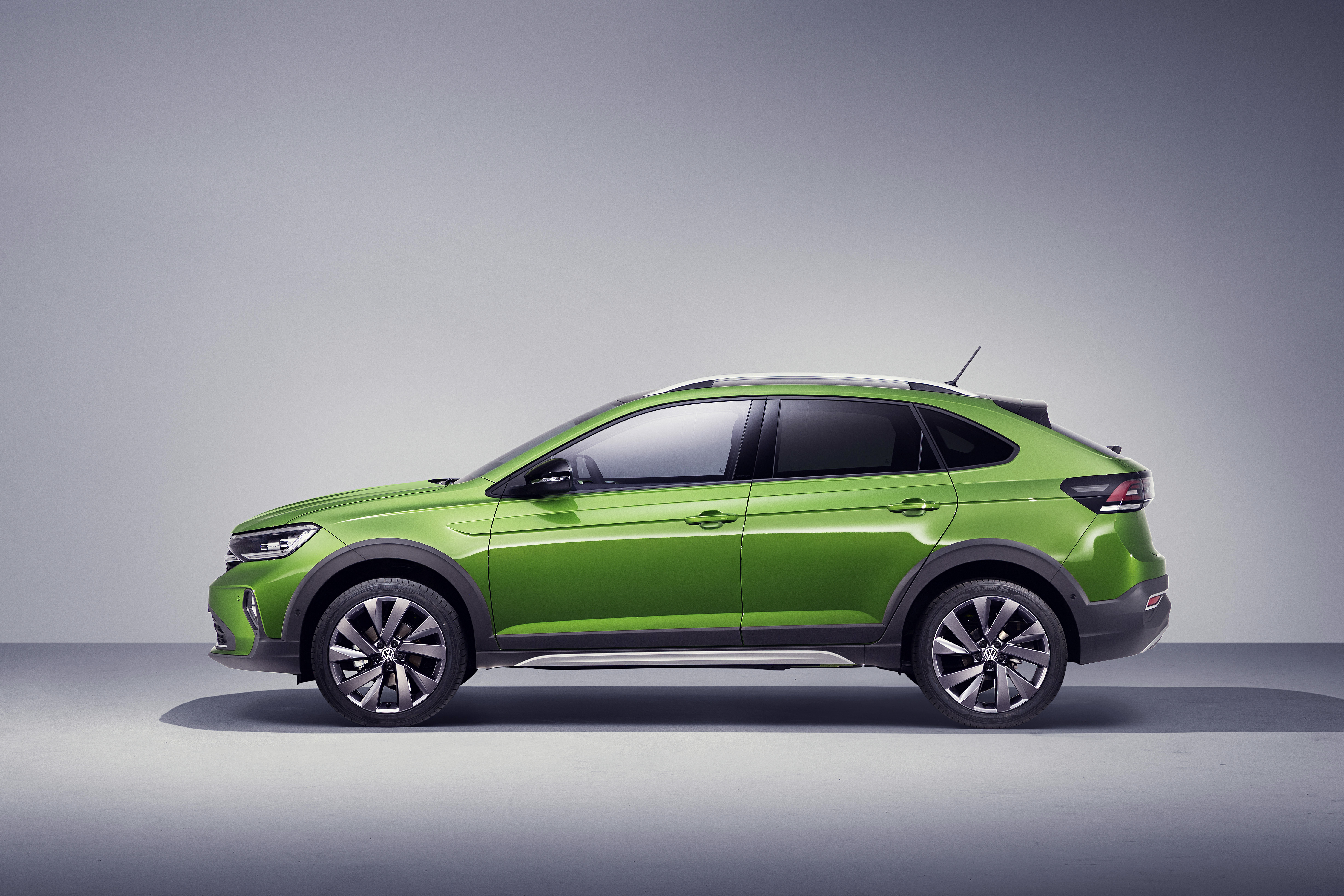 Vibrant green Volkswagen Taigo SUV HD Wallpaper