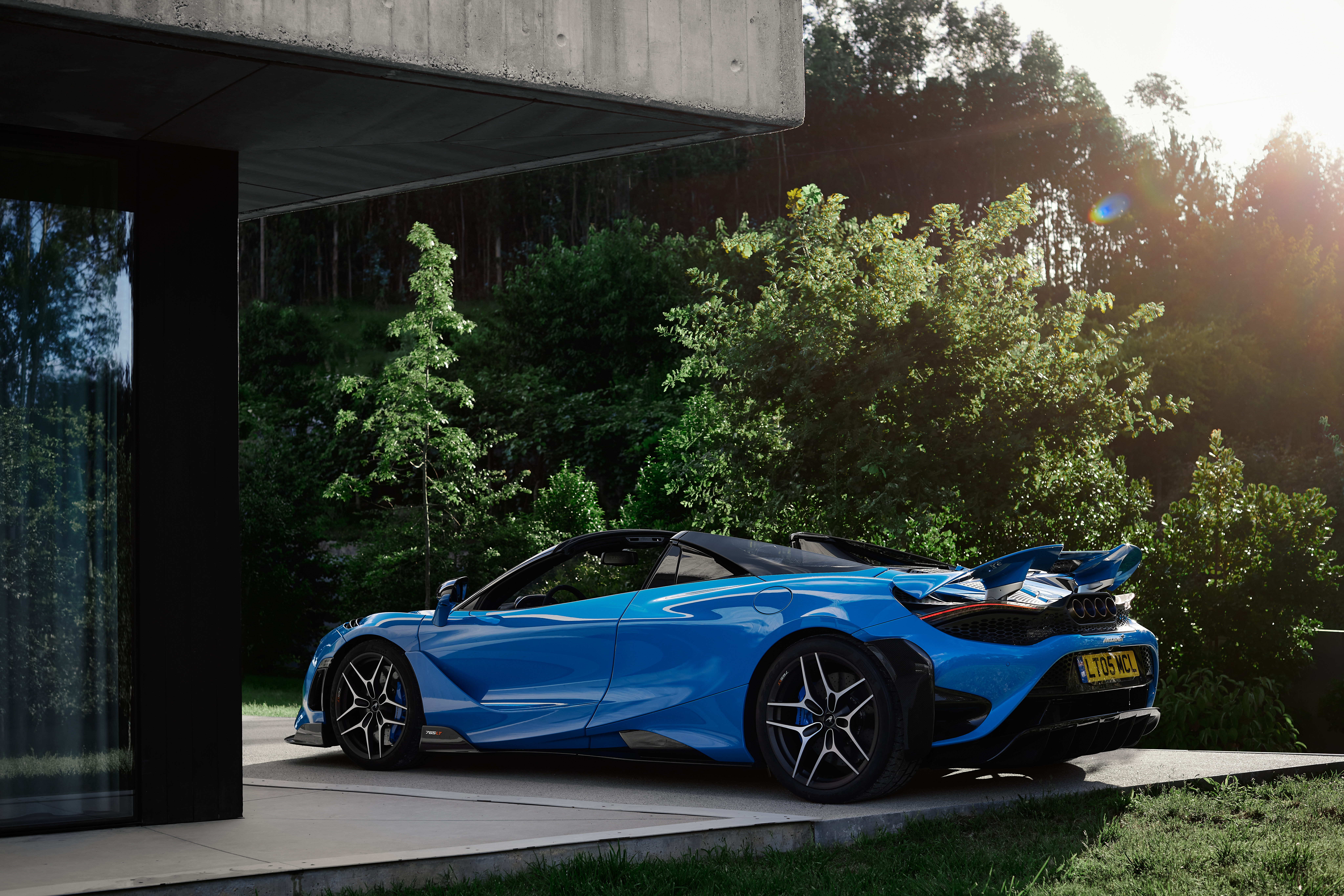 Stunning blue McLaren 765LT Spider at golden hour HD Wallpaper