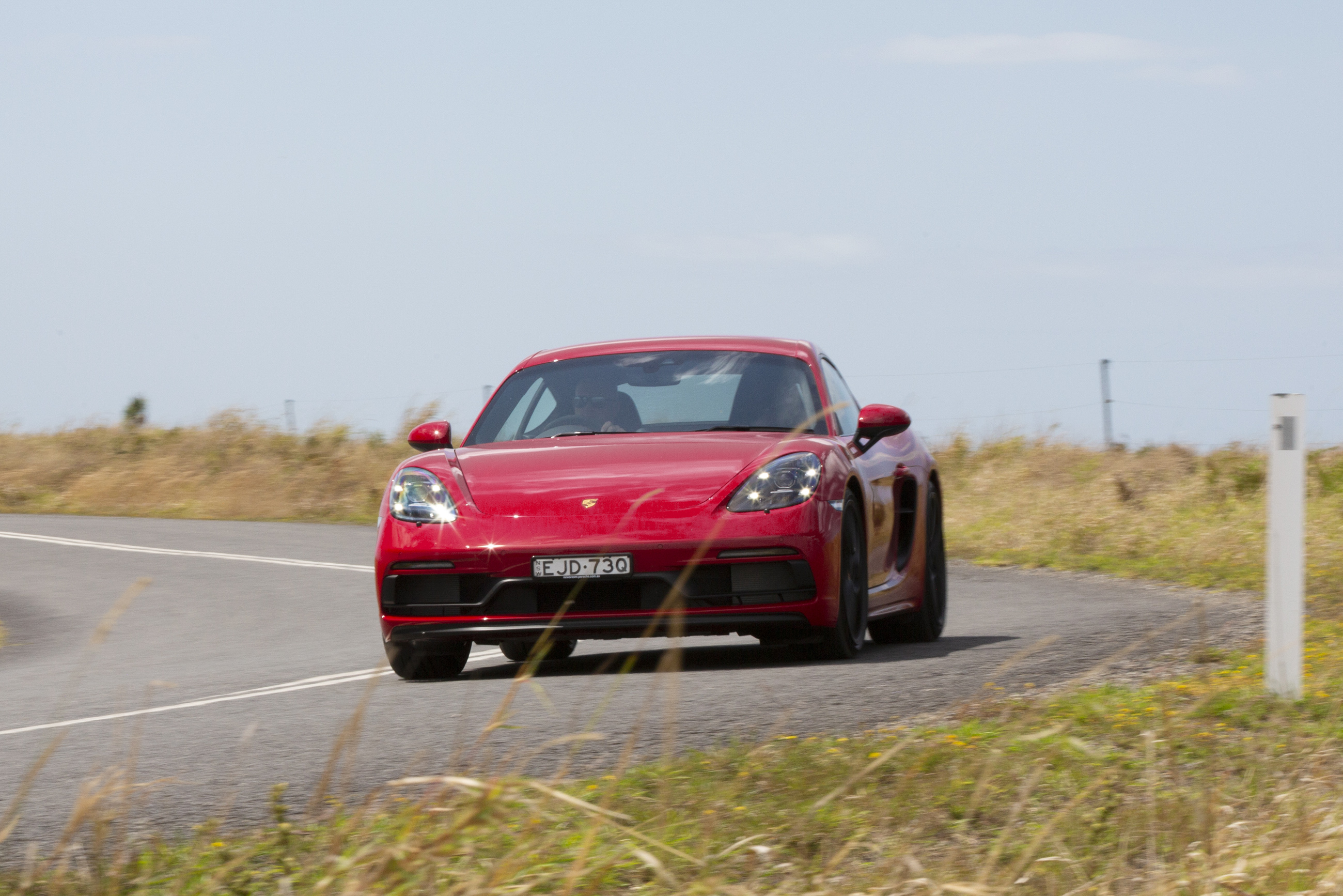 Red Porsche 718 Cayman GTS 4.0 Sport Car on Road HD Wallpaper