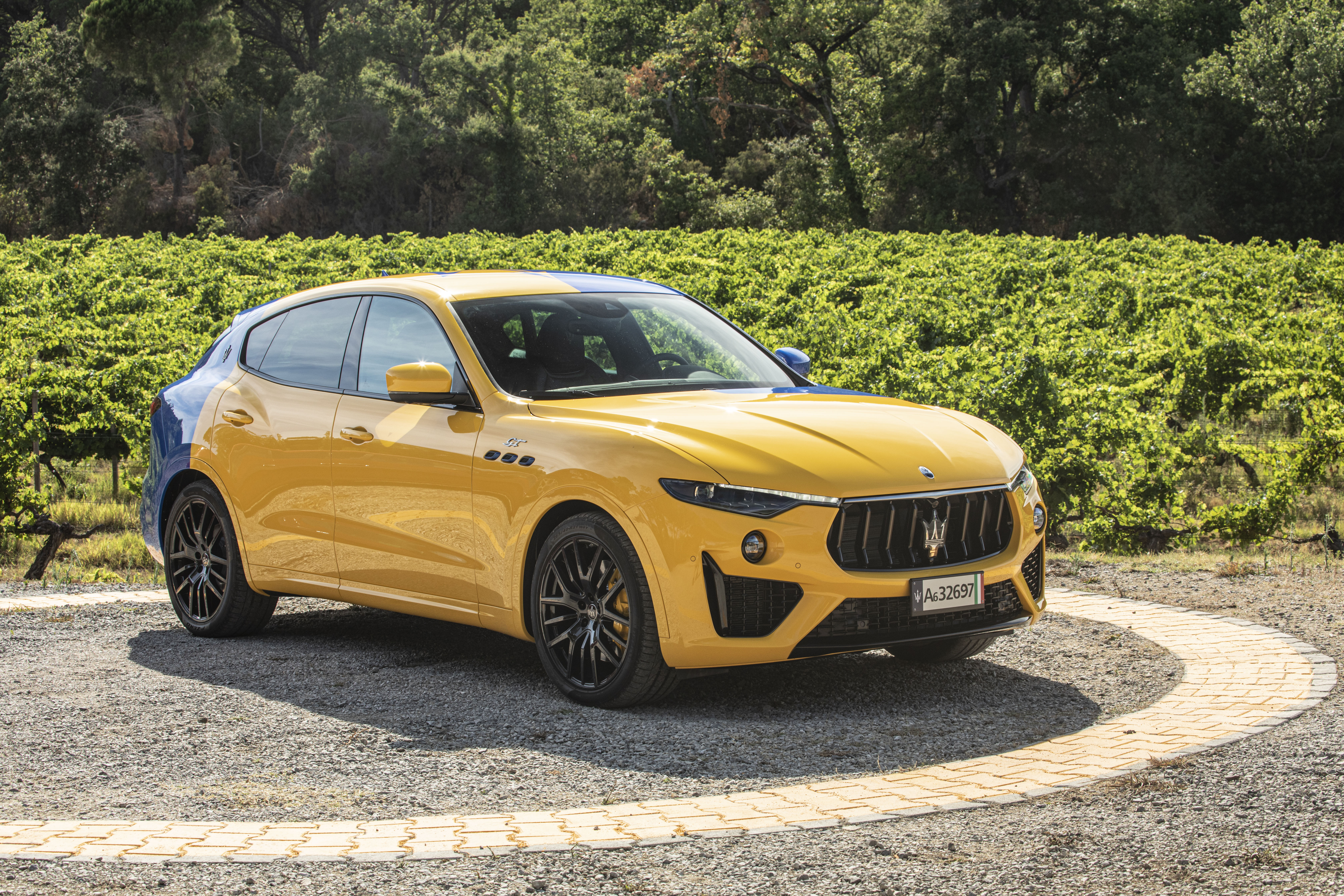 Yellow and Blue Maserati Levante GT Hybrid Fuoriserie SUV in Vineyard HD Wallpaper