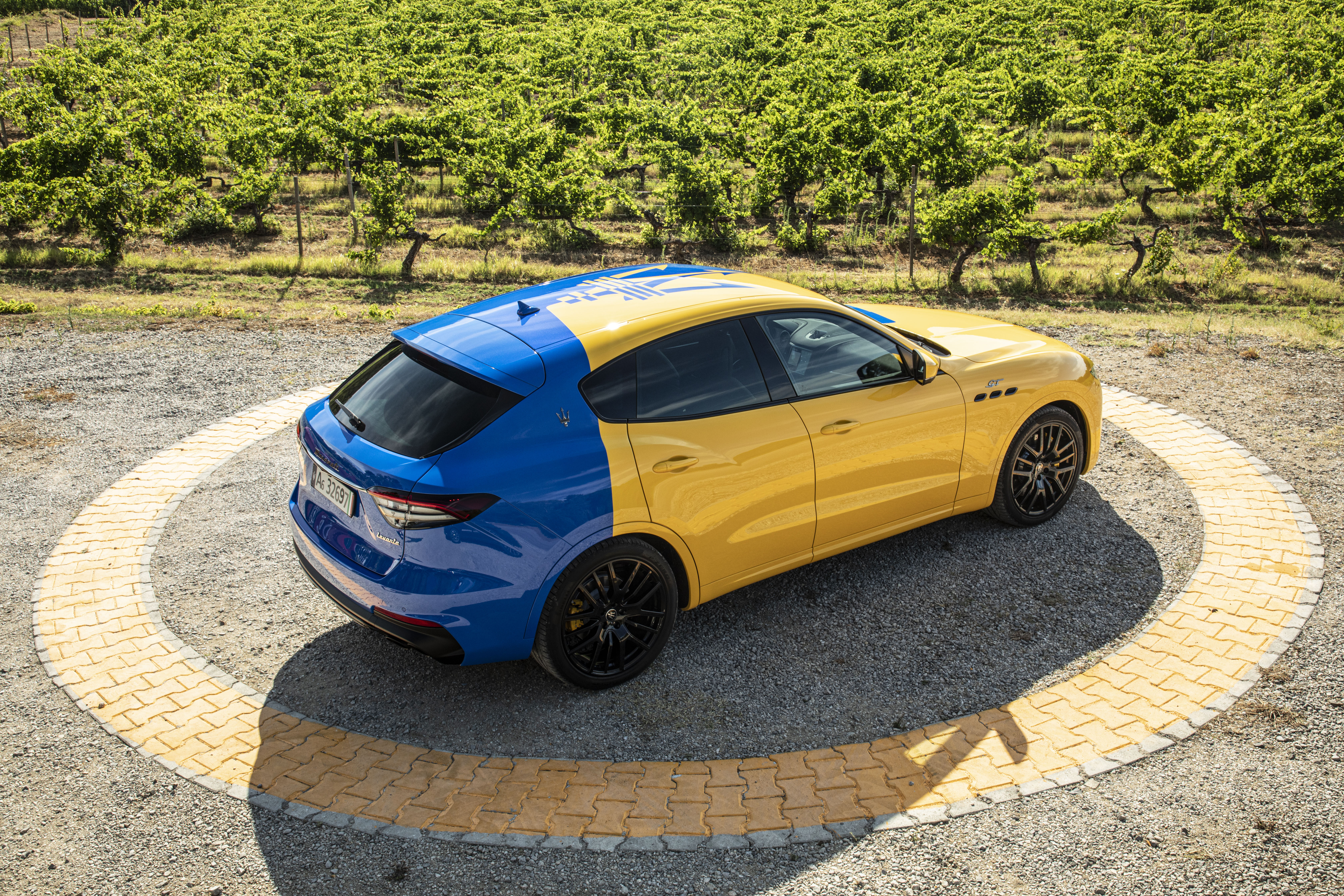Maserati Levante Fuoriserie SUV, blue and yellow, in vineyard HD Wallpaper