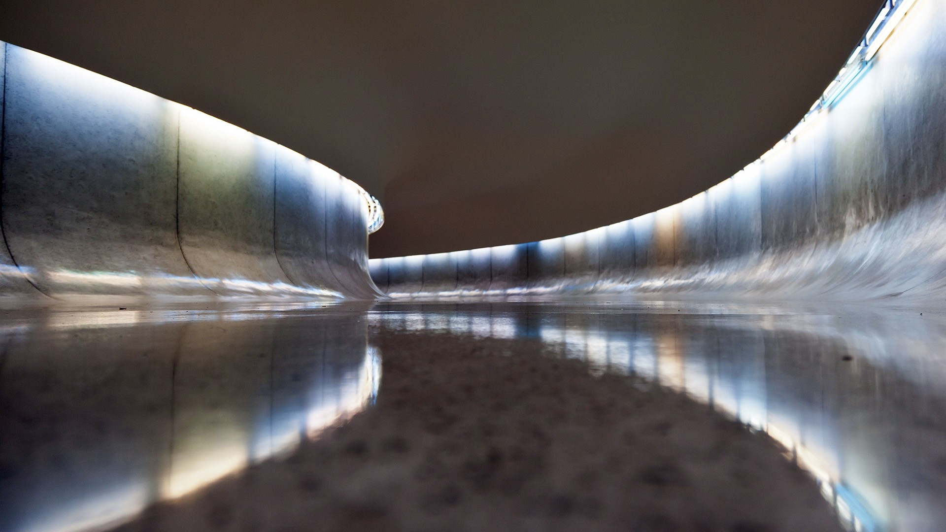 Illuminated Modern Tunnel with Reflection HD Wallpaper