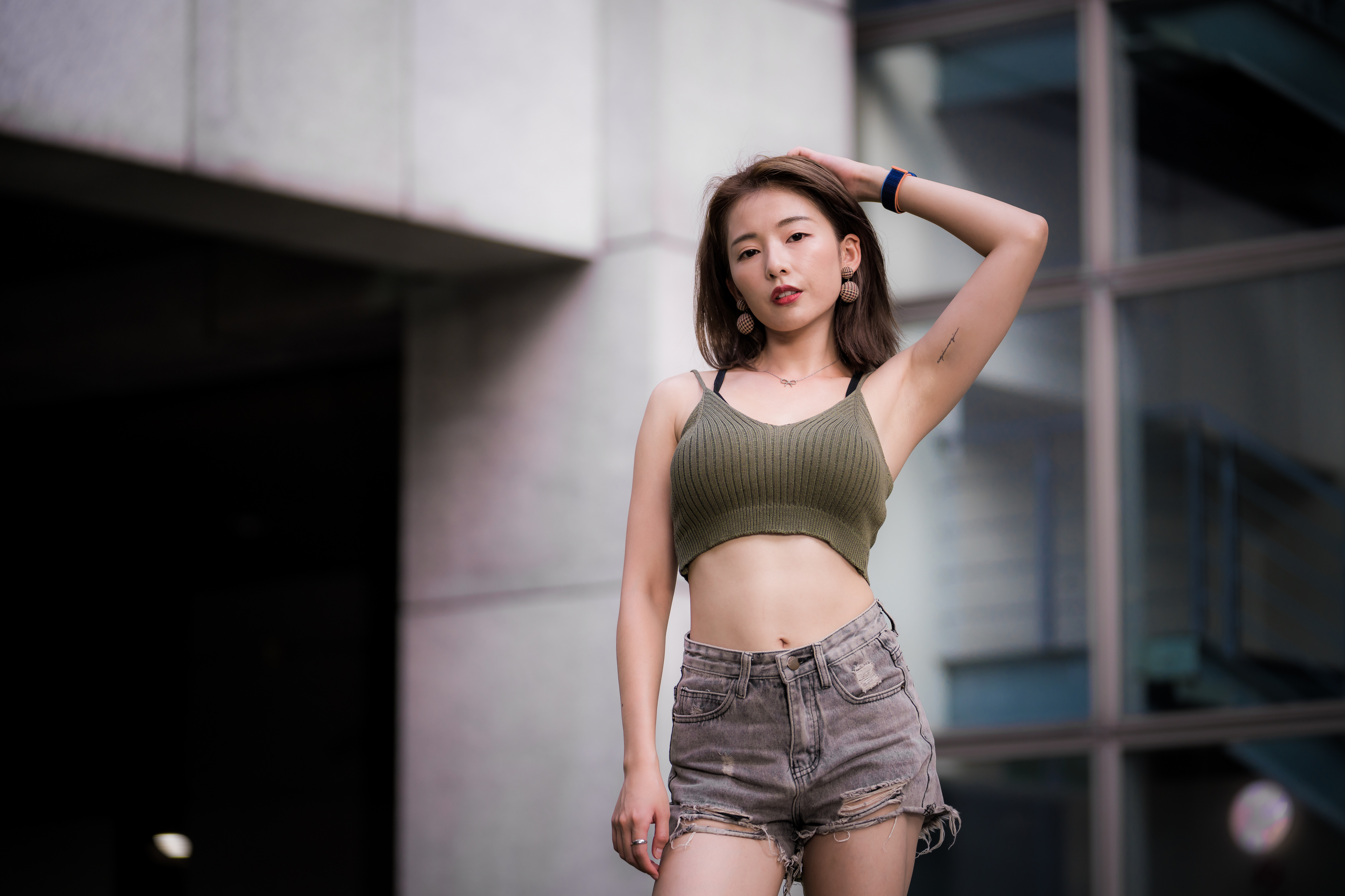 4K Asian Model in Shorts Posing HD Wallpaper