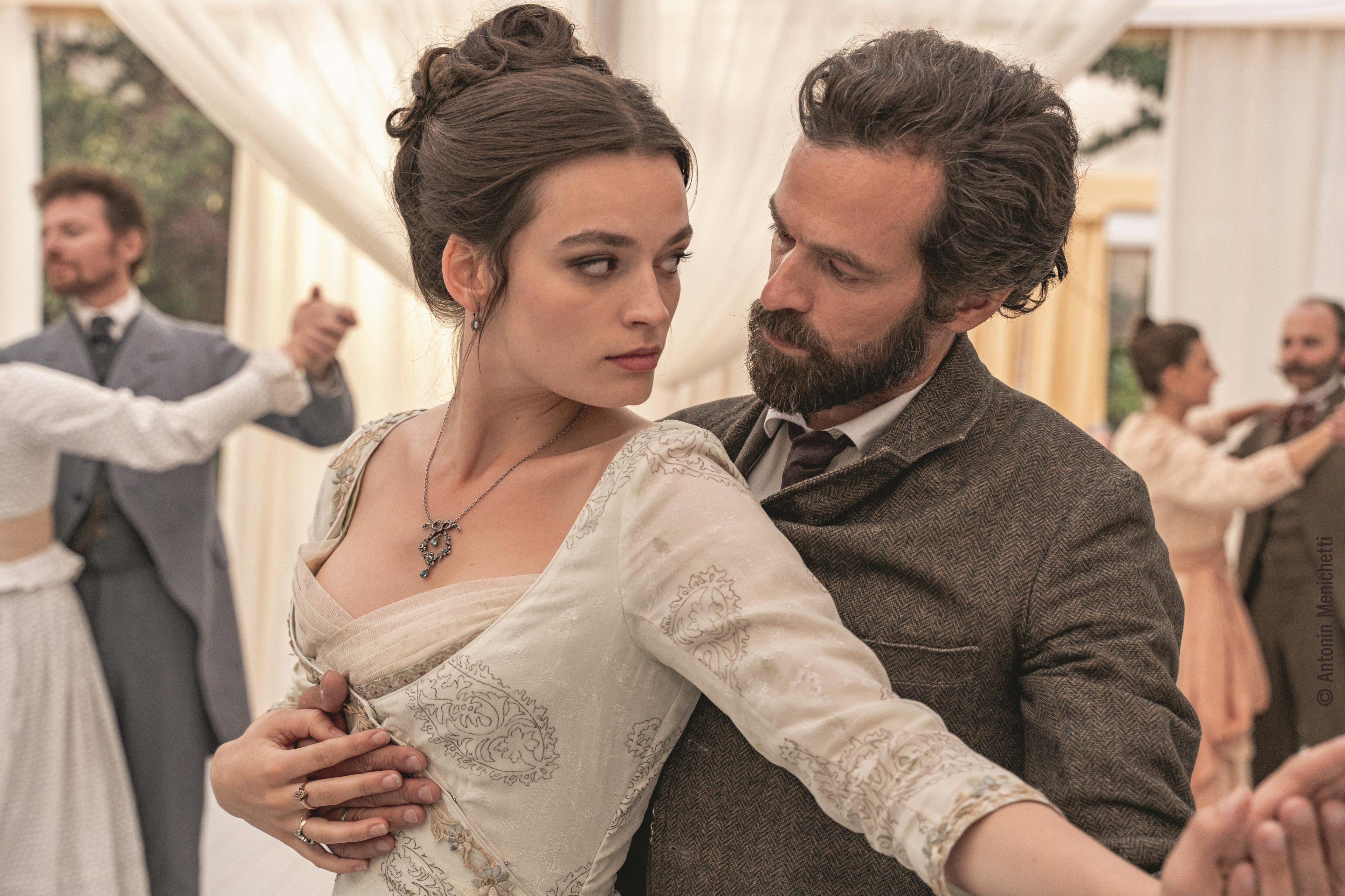 Emma Mackey and Romain Duris dancing HD Wallpaper