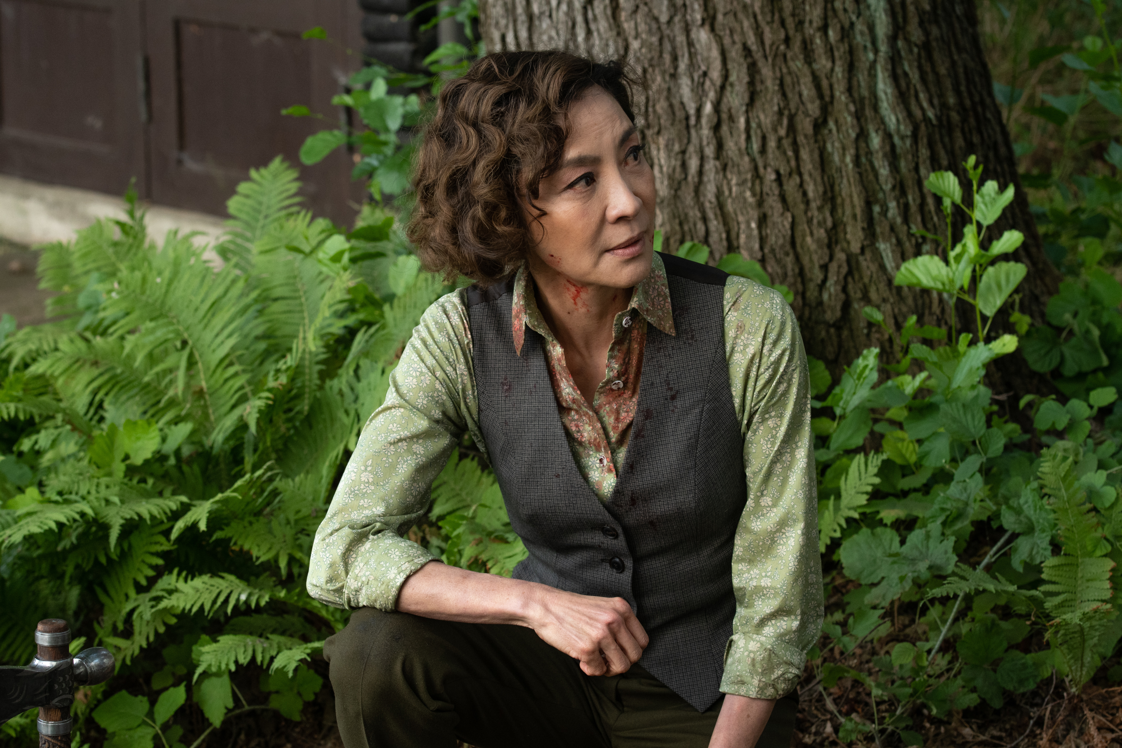 Michelle Yeoh with blood on shirt in Gunpowder Milkshake HD Wallpaper