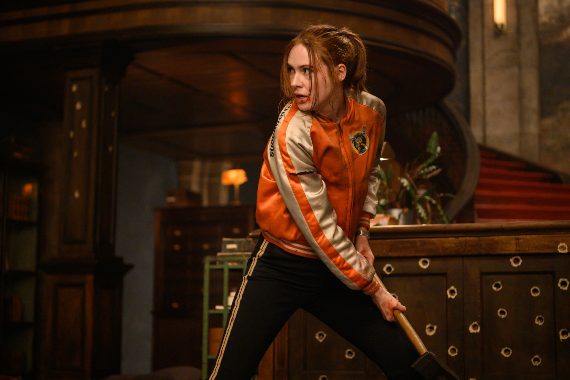 Karen Gillan in Gunpowder Milkshake action scene HD Wallpaper