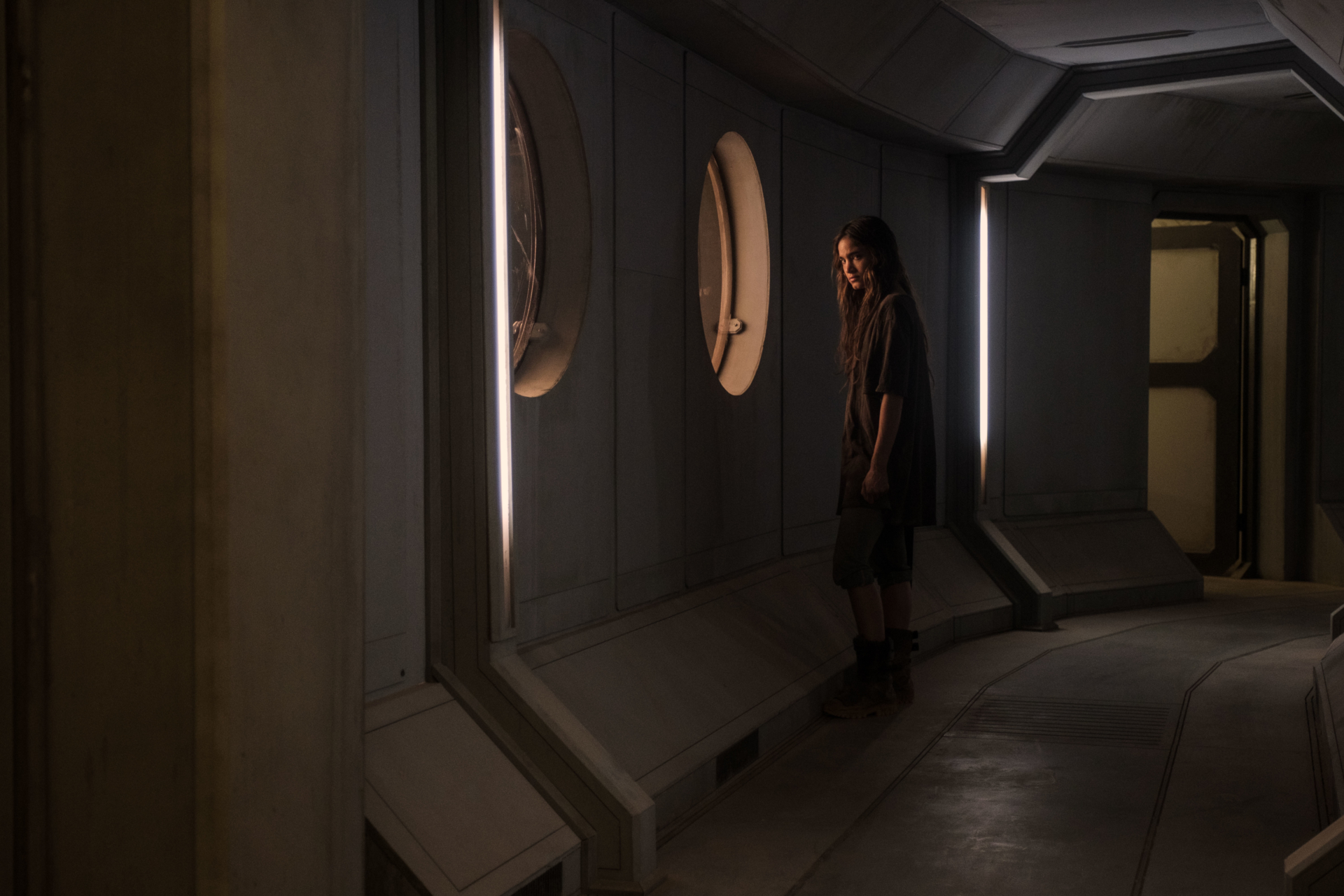 Sofia Boutella in a dark corridor from Settlers HD Wallpaper