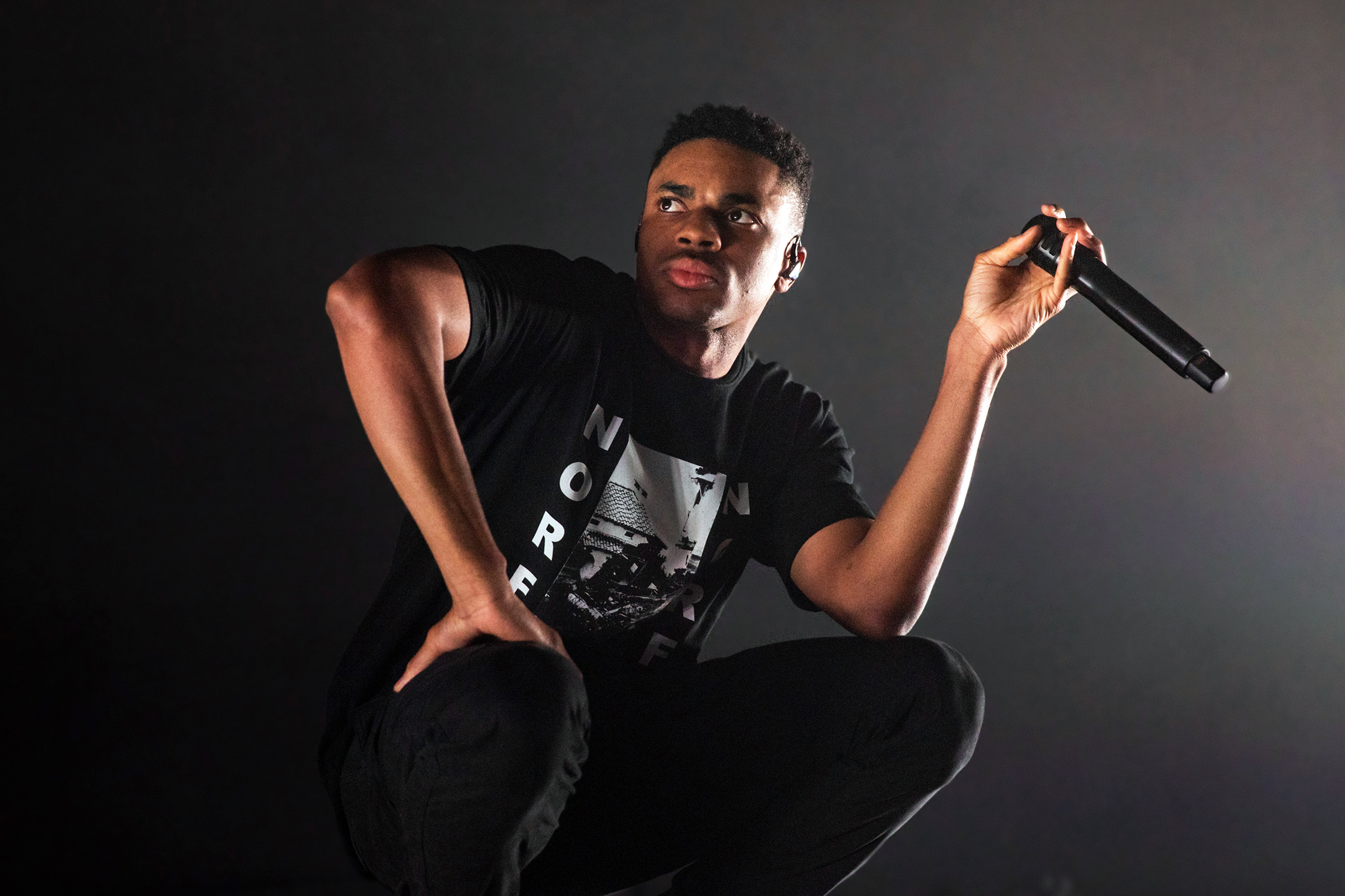 Vince Staples performing live with microphone HD Wallpaper