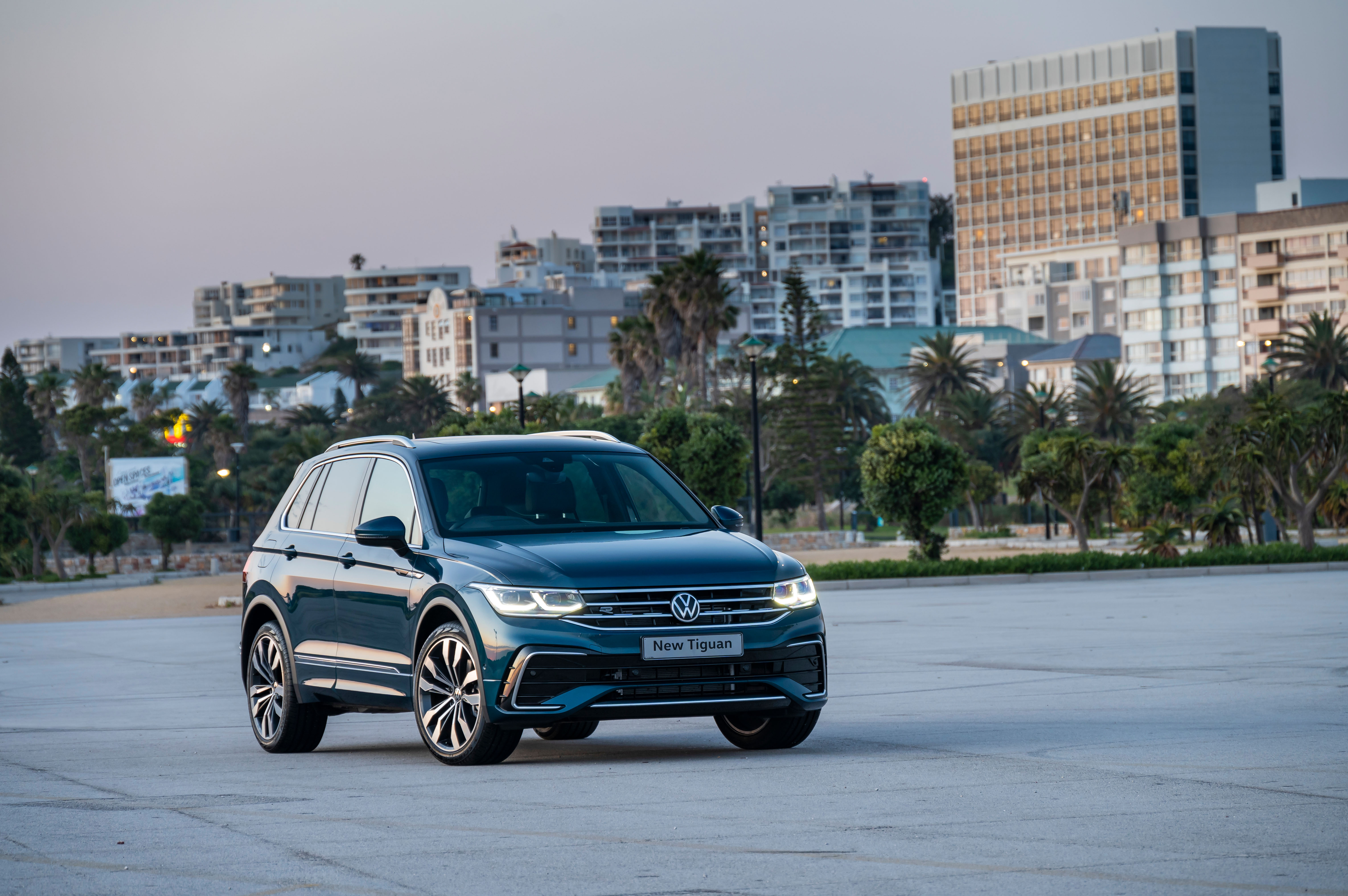 New Blue Volkswagen Tiguan R-Line SUV at dusk HD Wallpaper