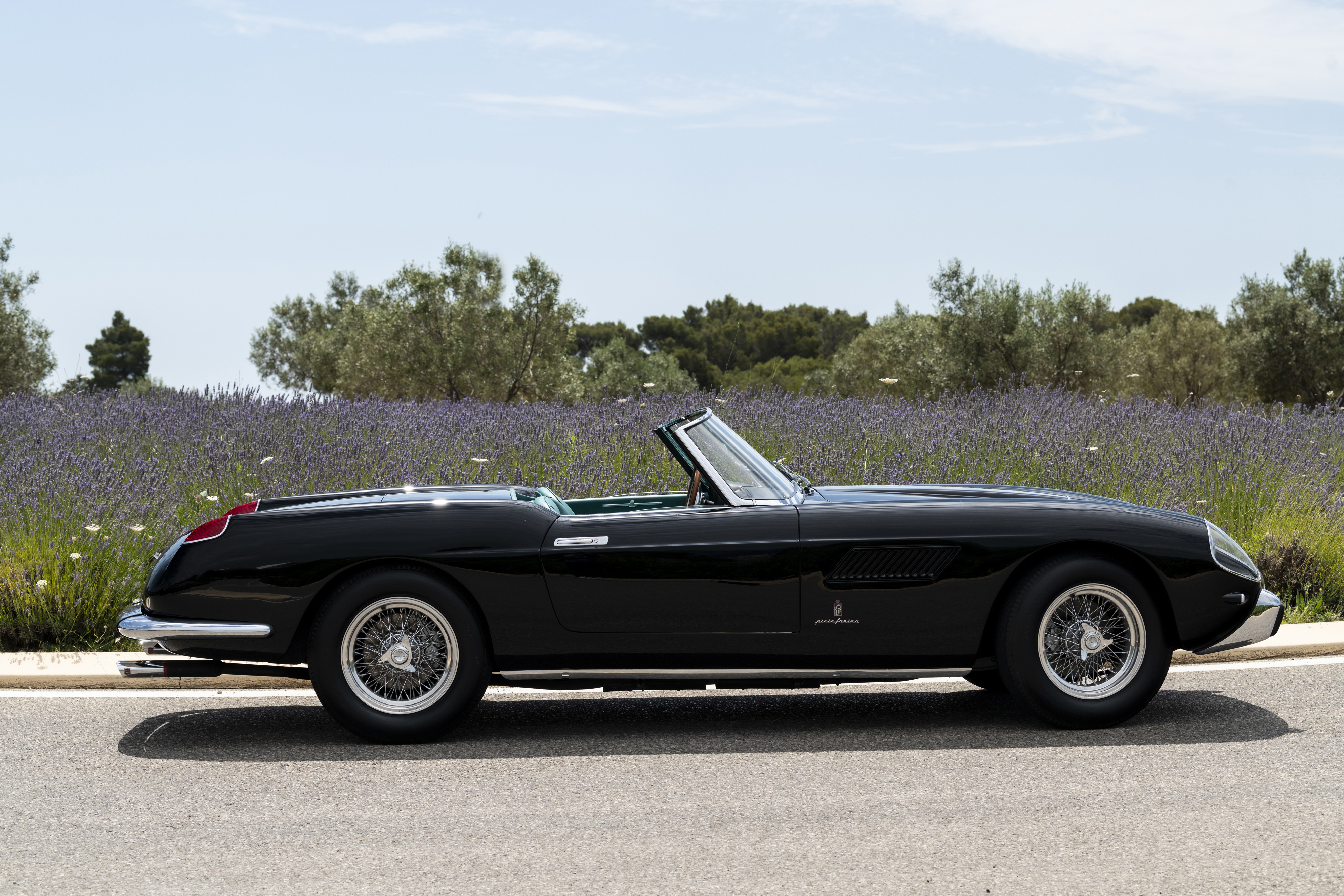 1950 Black Ferrari 250 GT Cabriolet in a lavender field HD Wallpaper