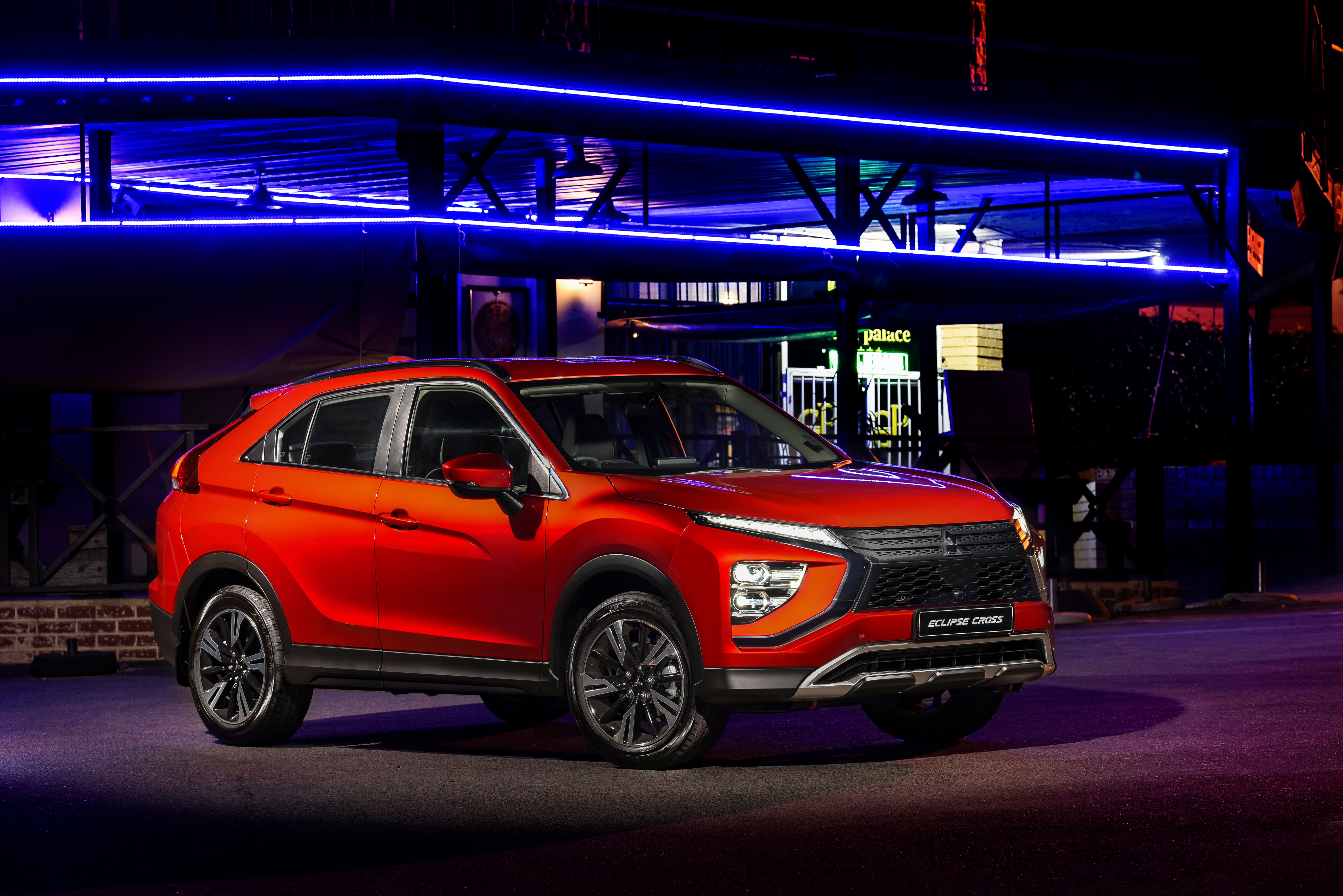 Mitsubishi Eclipse Cross SUV at night with blue lights 4K HD Wallpaper