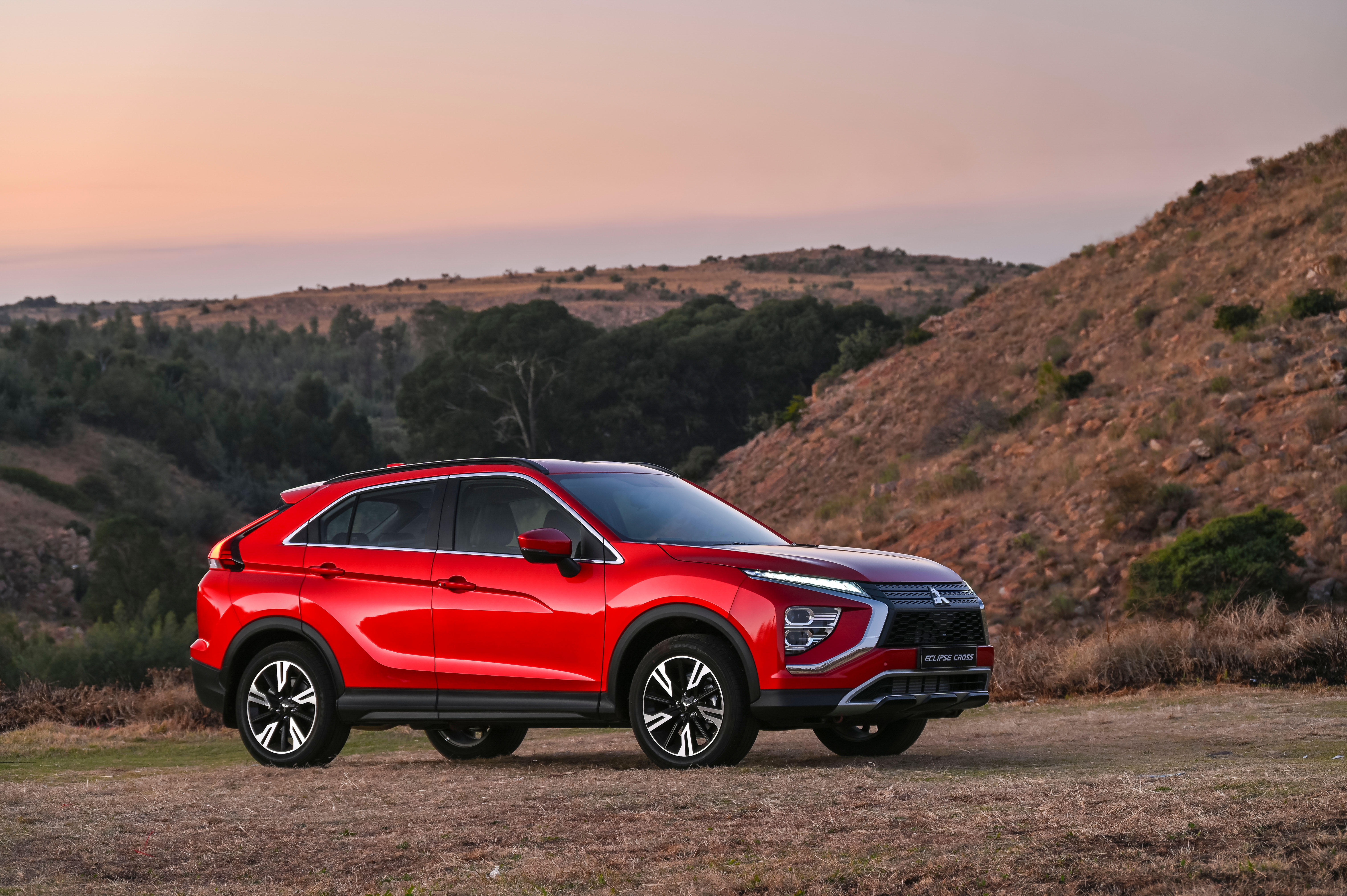 Red Mitsubishi Eclipse Cross 4K SUV at sunset HD Wallpaper
