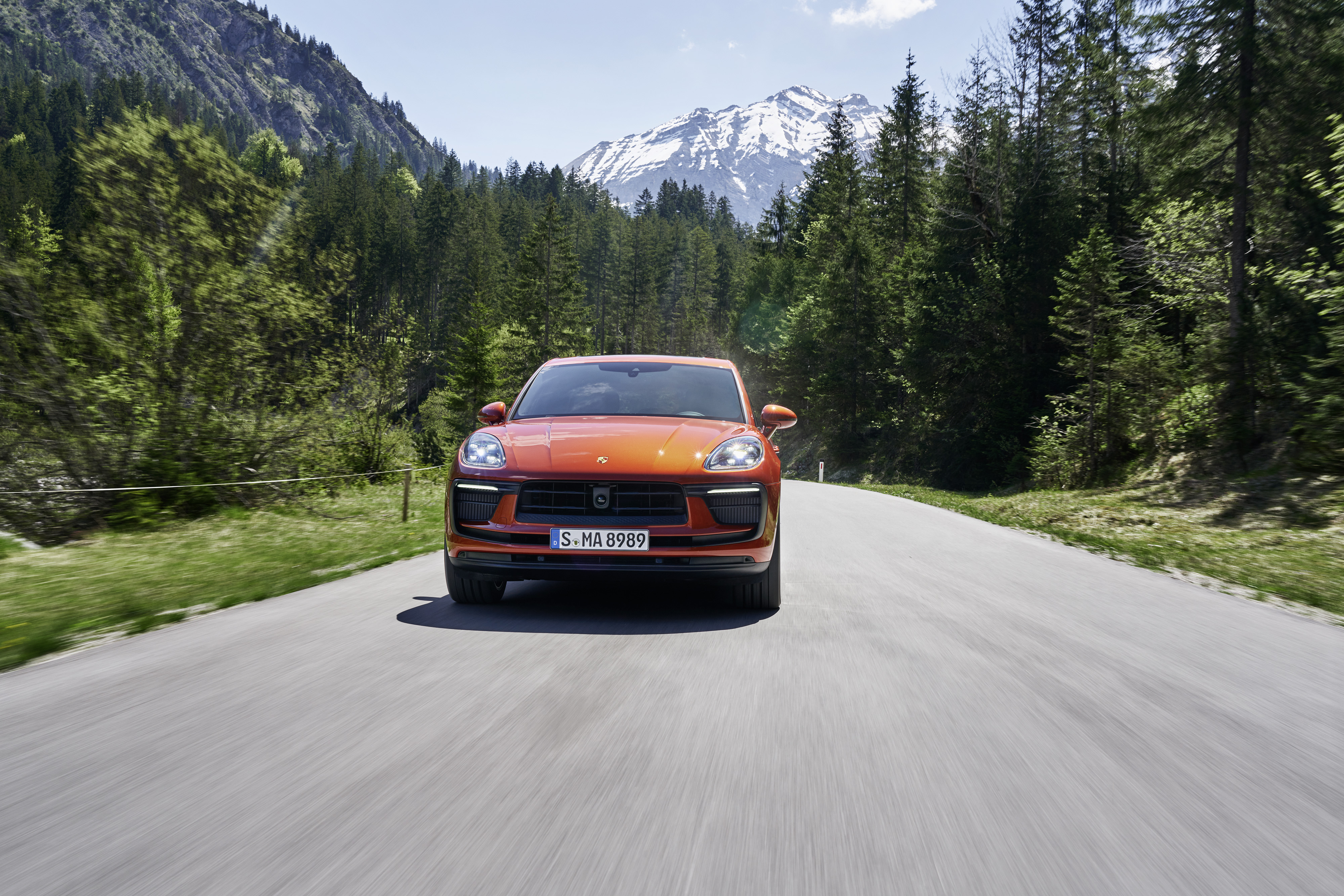 Red Porsche Macan S SUV on a mountain road HD Wallpaper