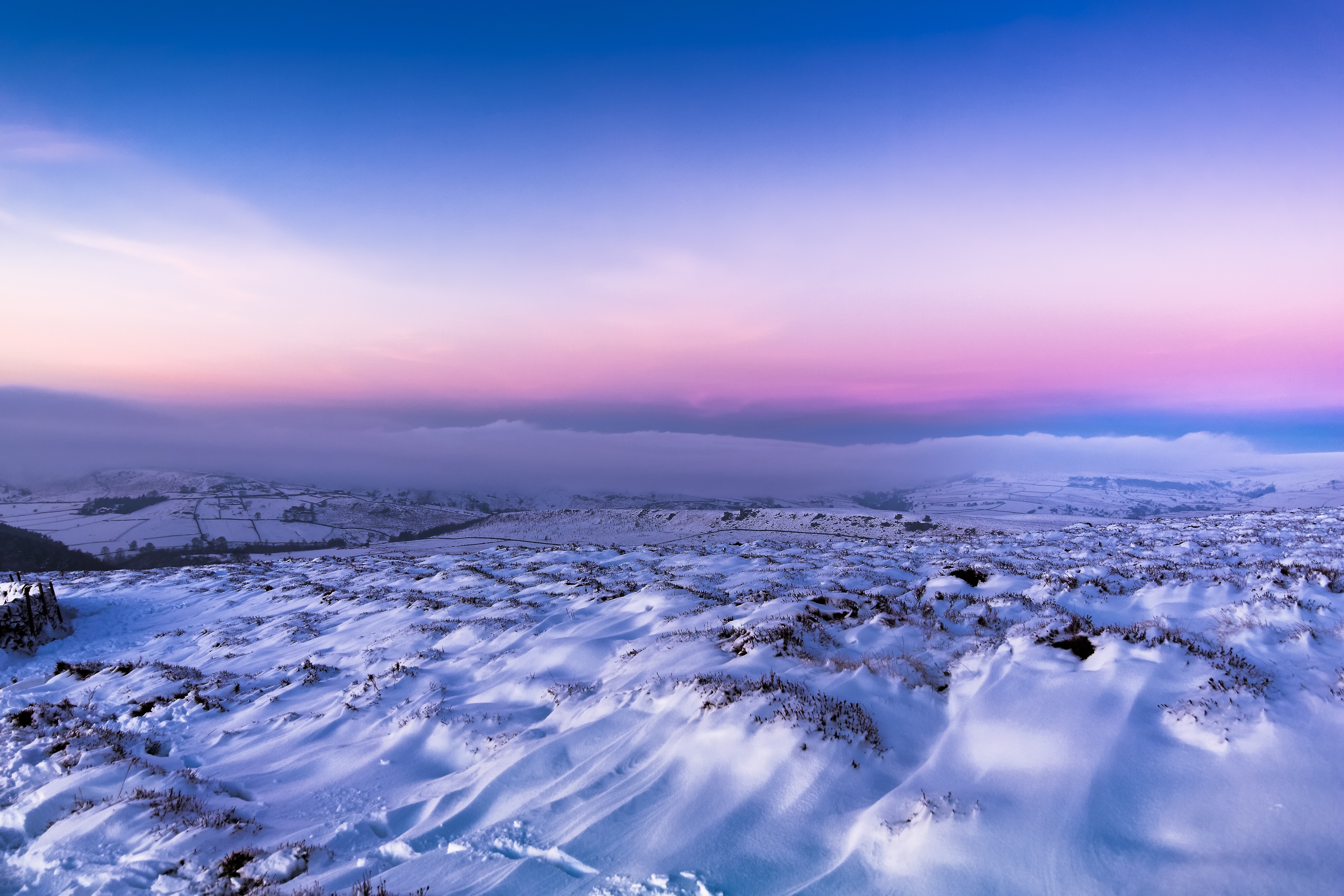 Vibrant Winter Sky over Snowy Landscape HD Wallpaper