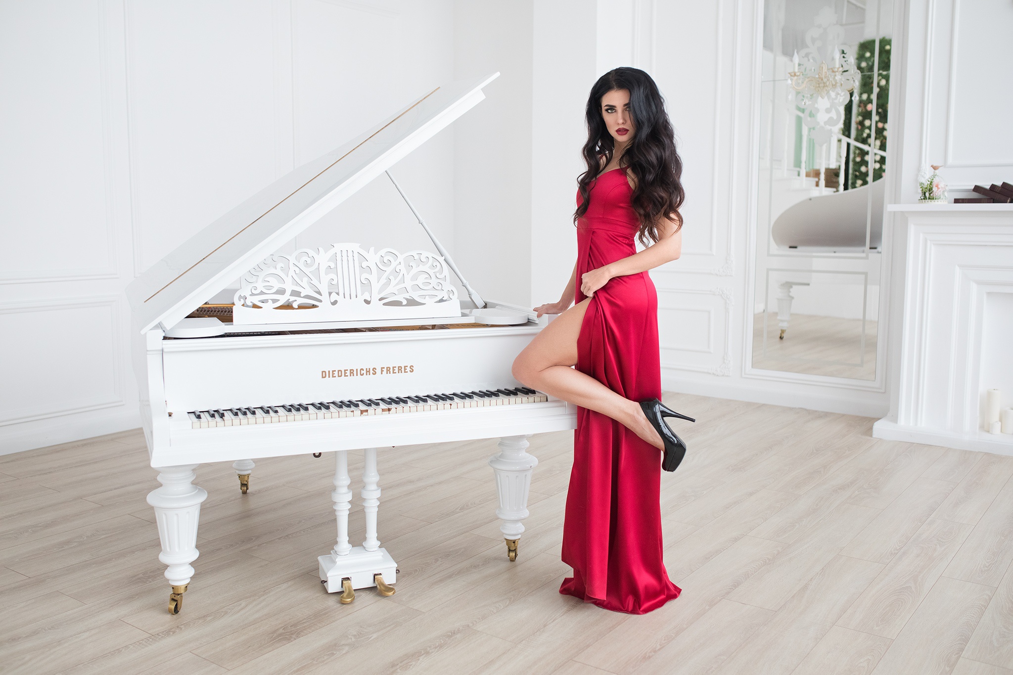 Elegant Woman in Red Dress Posing on White Piano HD Wallpaper