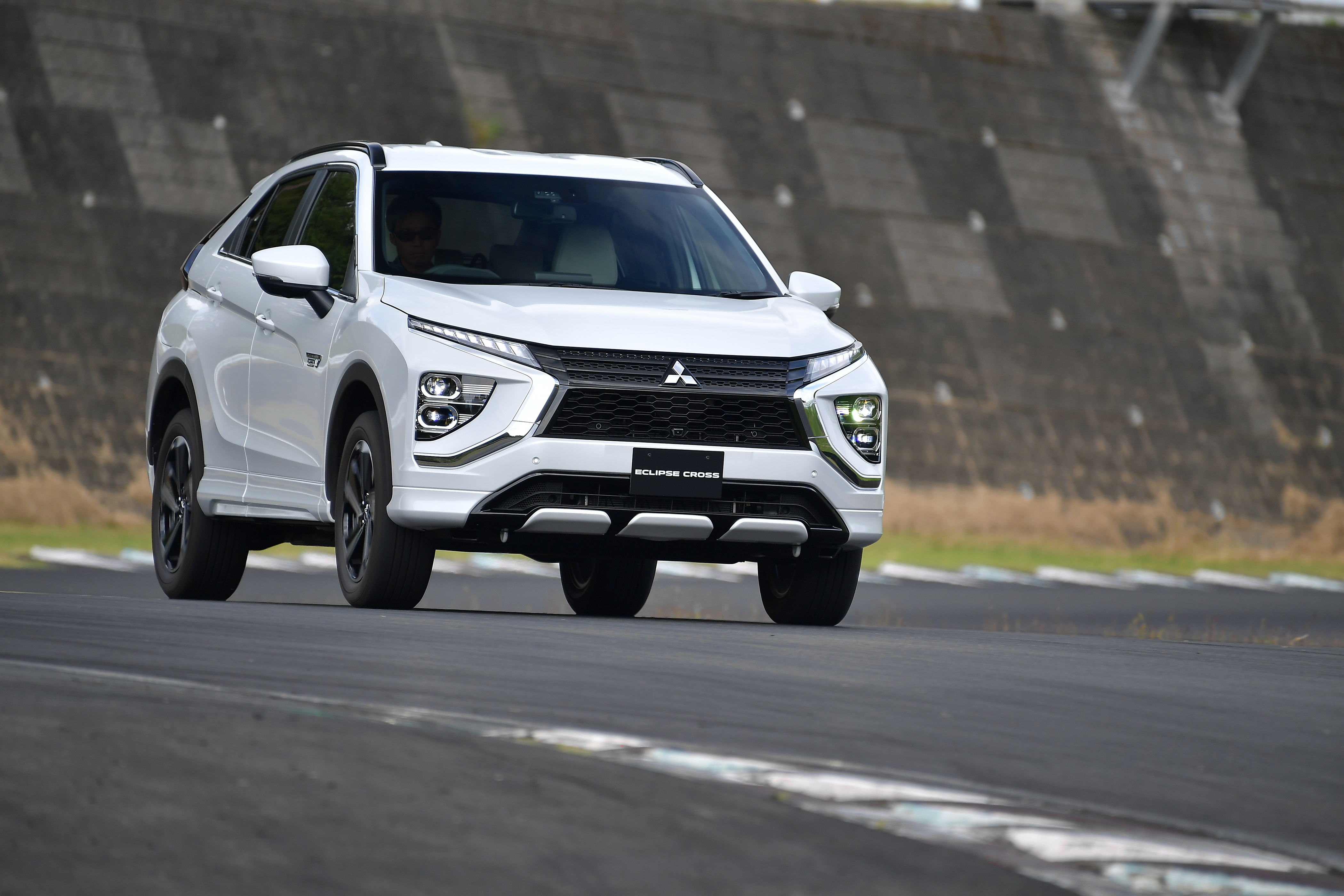 Mitsubishi Eclipse Cross 4K SUV on track HD Wallpaper