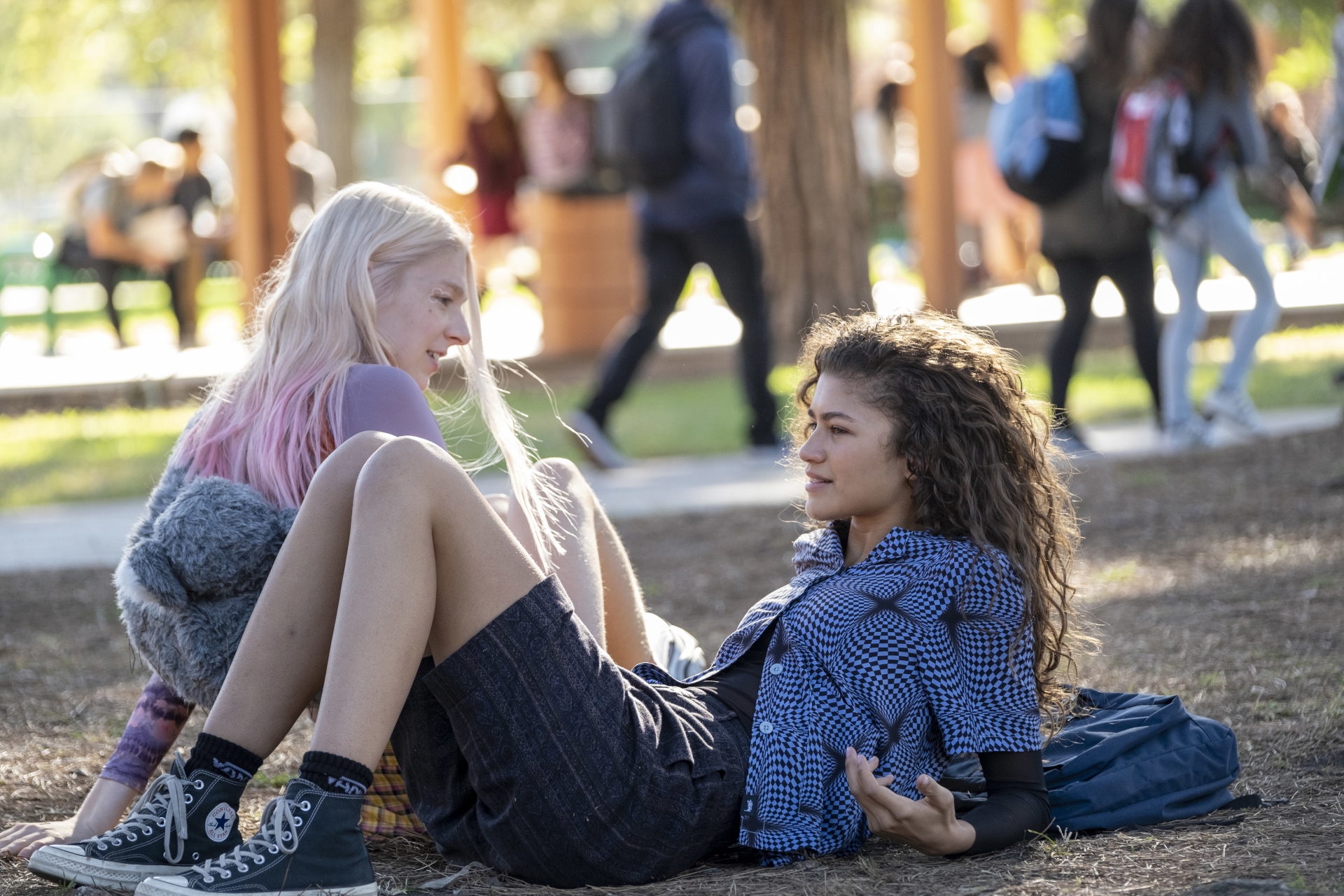 Zendaya and Hunter Schafer talking outdoors HD Wallpaper