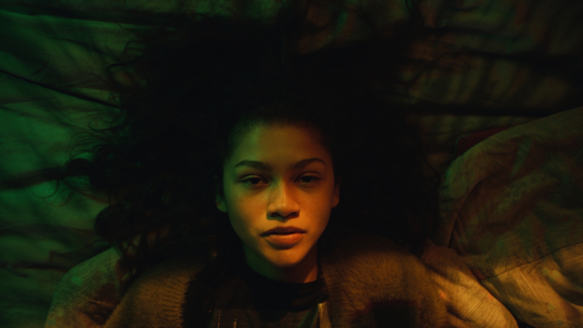 Zendaya in Euphoria with green and orange lighting HD Wallpaper