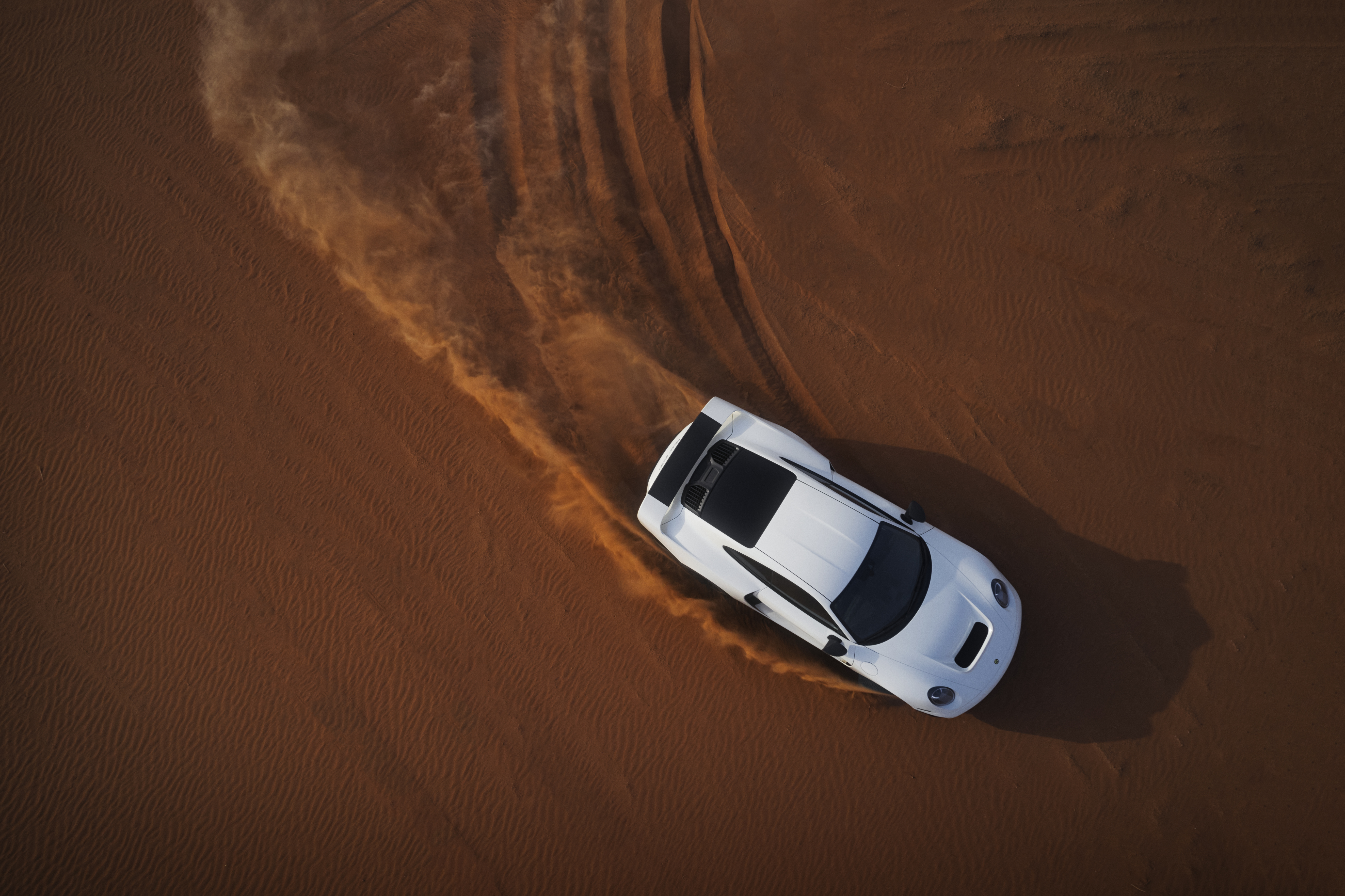 Marc Philipp Gemballa Marsien kicking up sand dunes HD Wallpaper