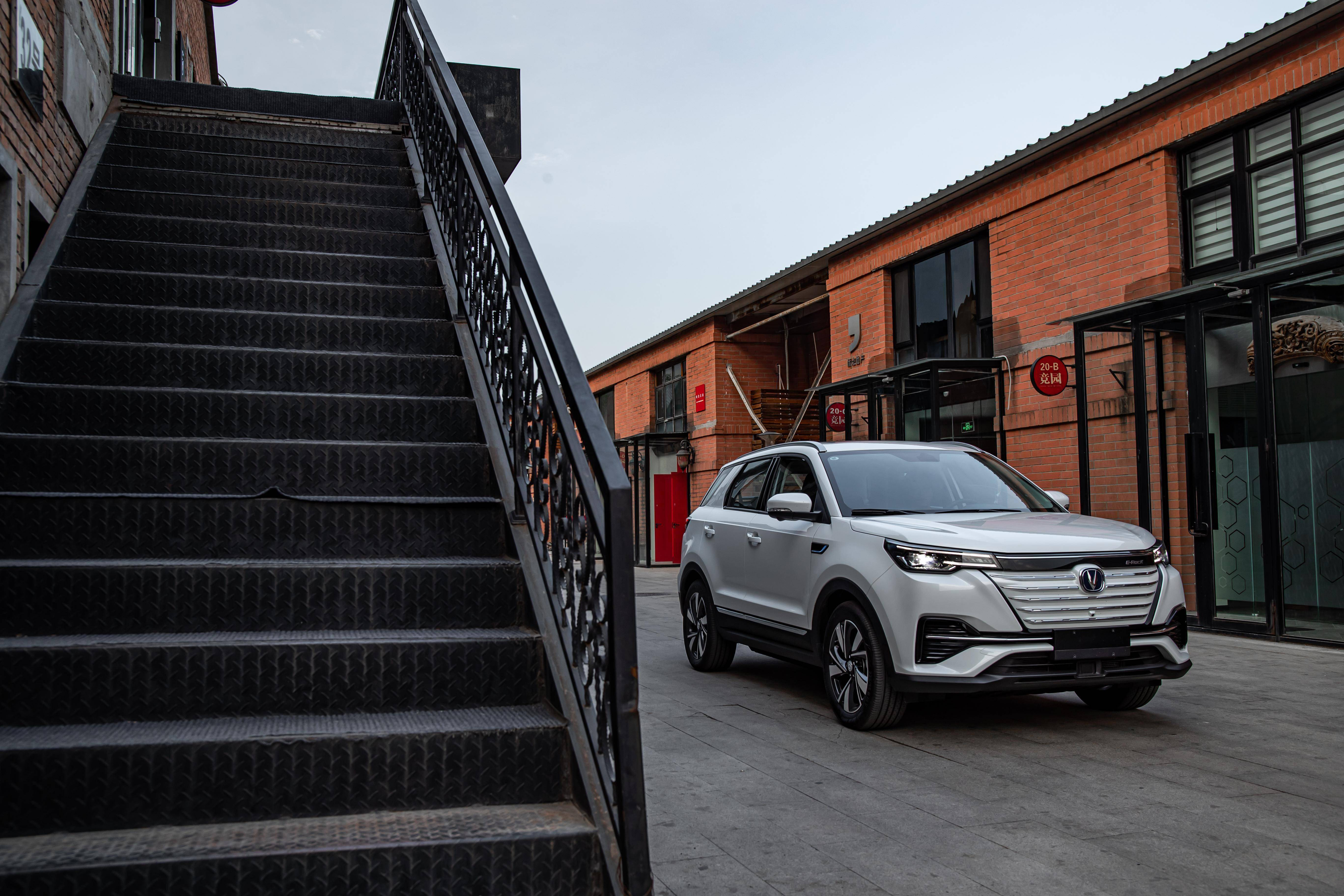 White Changan CS55 E-Rock SUV in urban setting HD Wallpaper