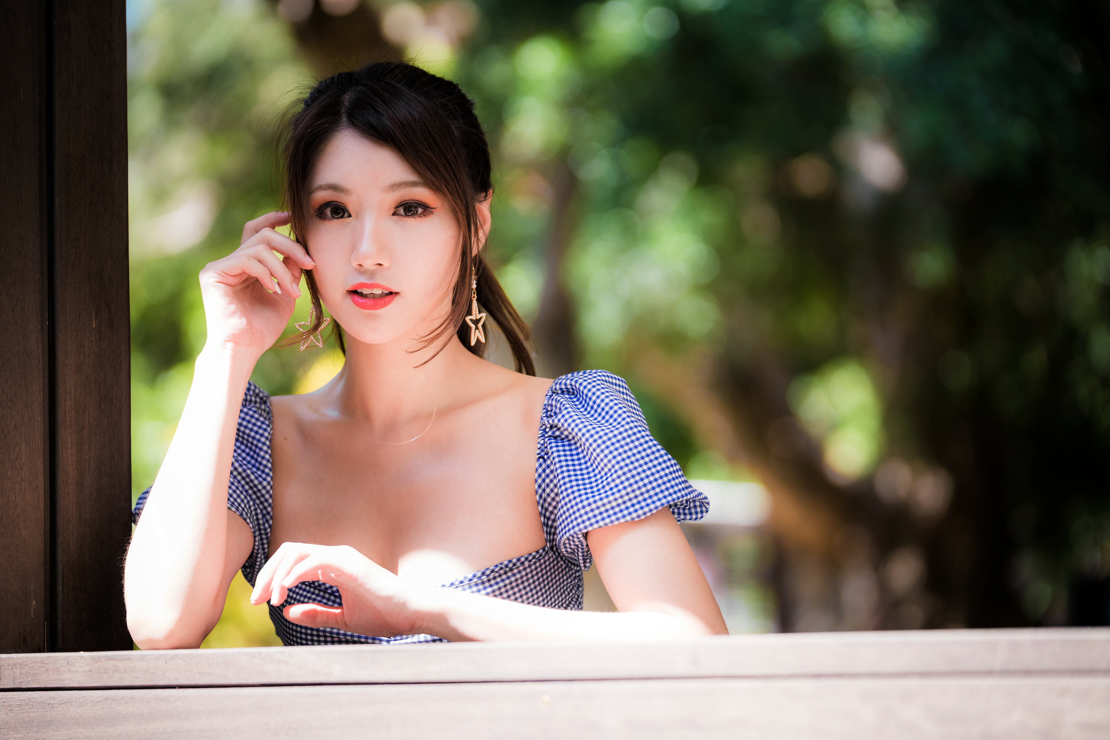 Asian Model with Bokeh Effects in 4K HD Wallpaper