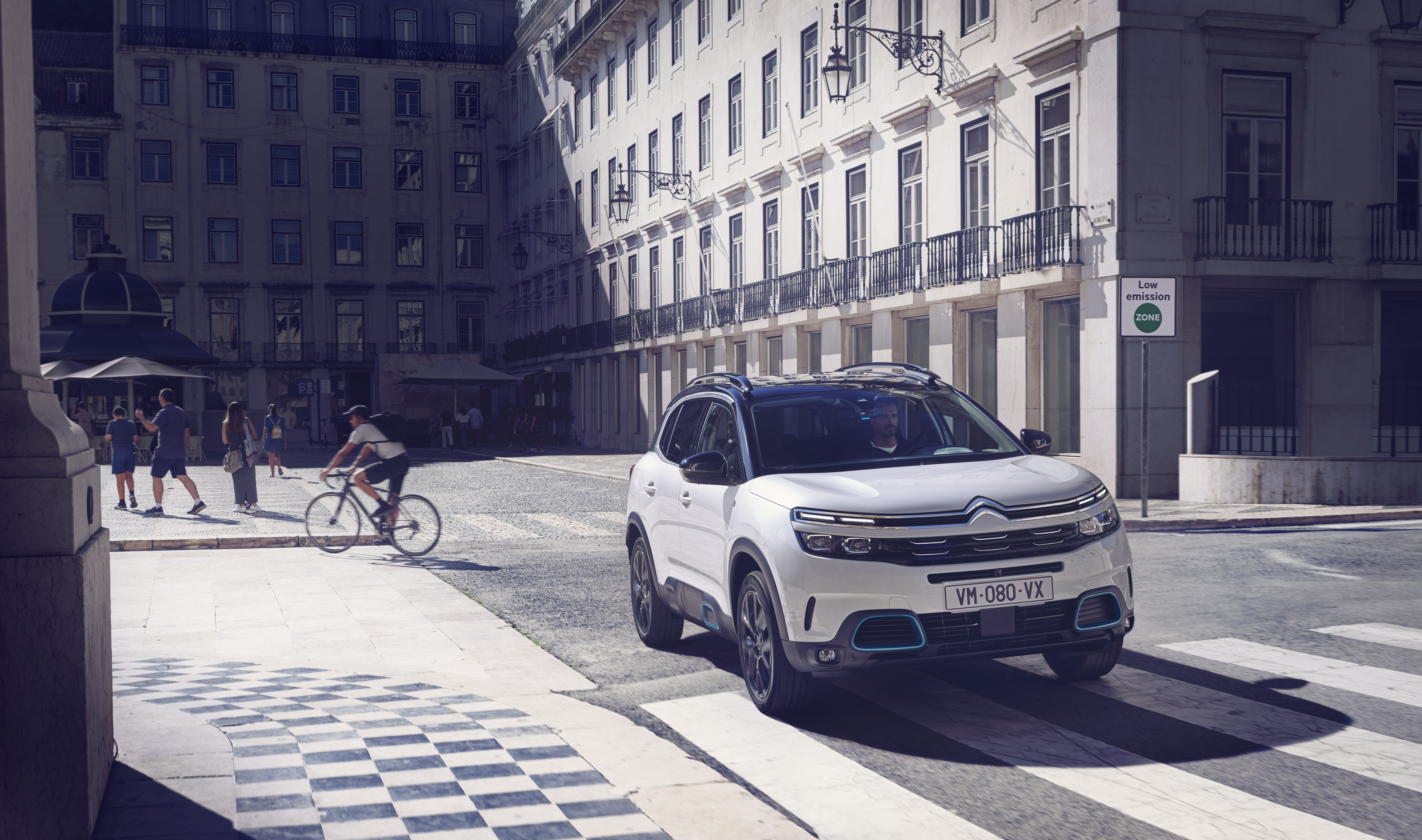 White Citroën C5 Aircross SUV Hybrid on city street HD Wallpaper
