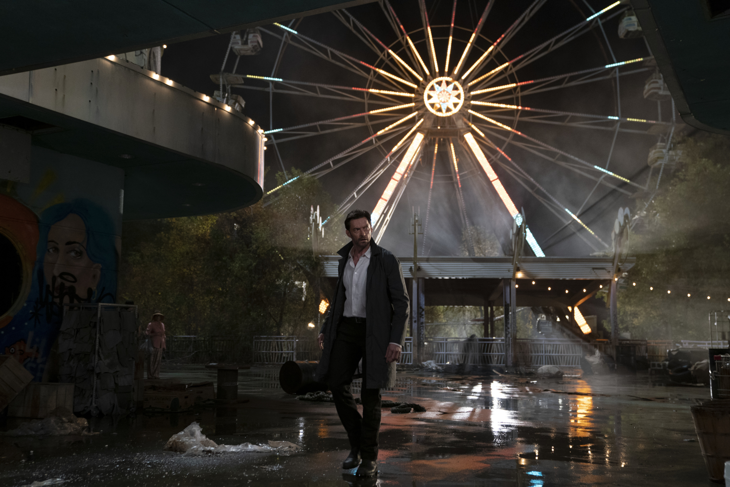 Hugh Jackman in Reminiscence at a dark carnival HD Wallpaper