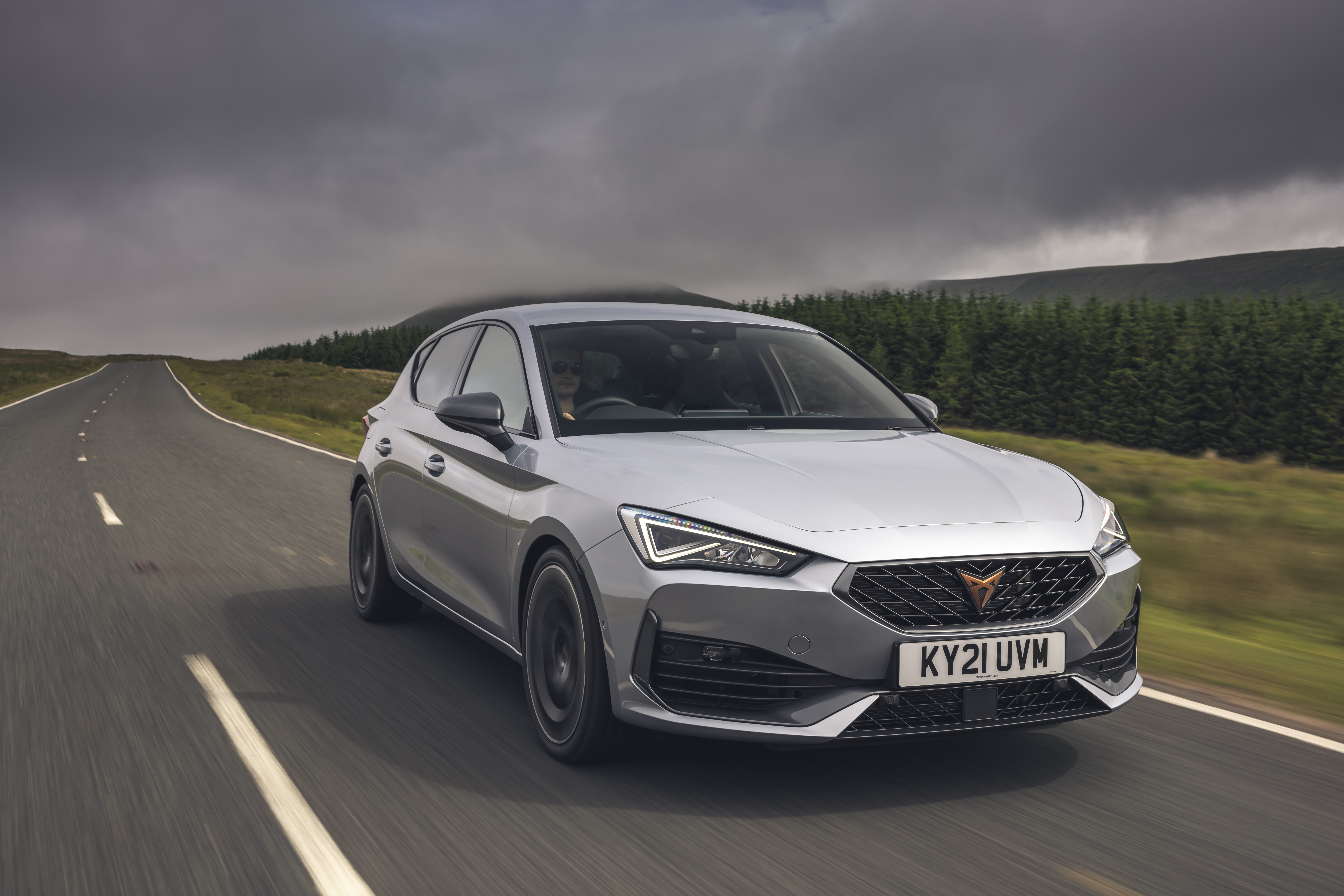 Silver 2021 Cupra Leon VZ3 driving on a road HD Wallpaper