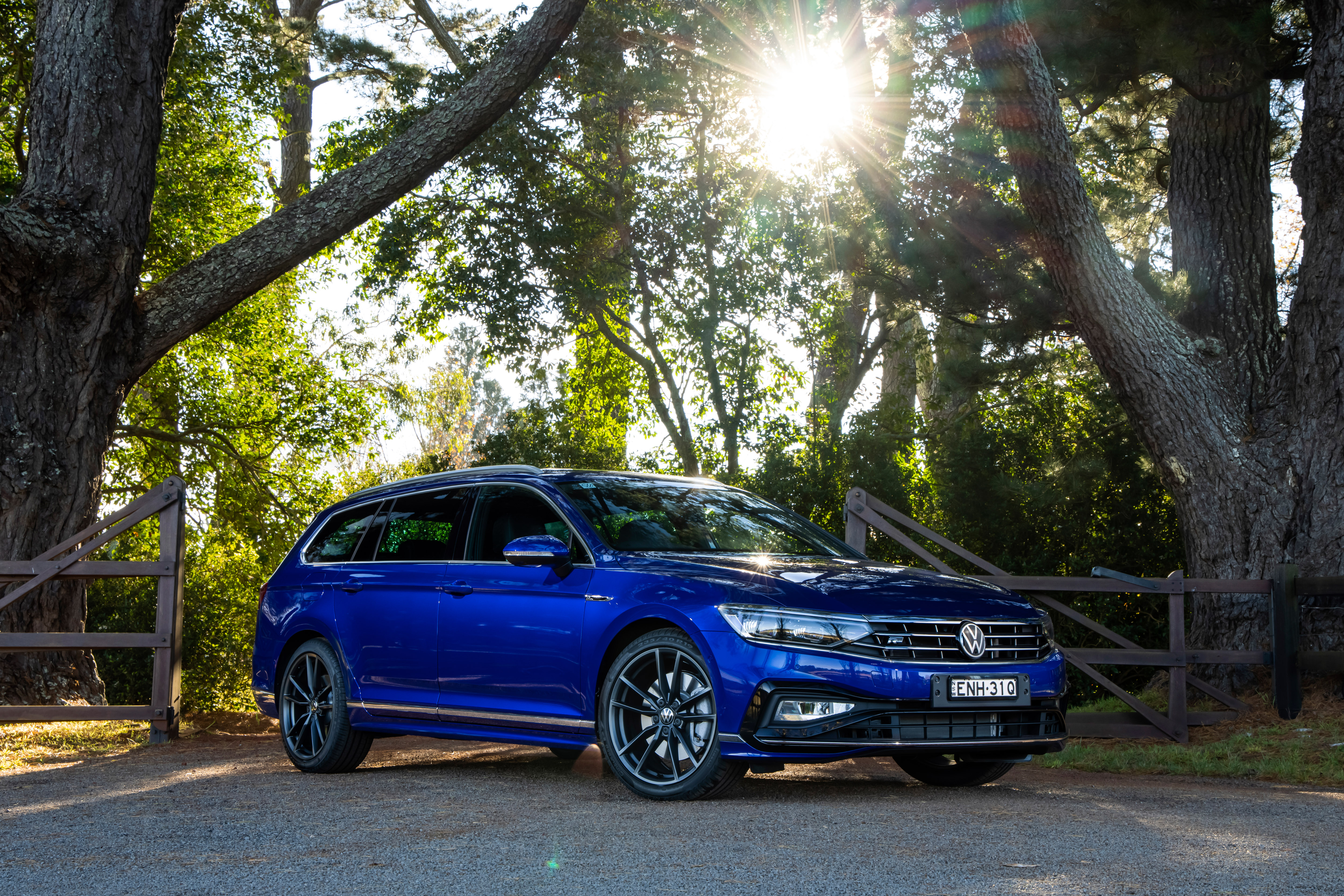 Blue 2021 Volkswagen Passat R-Line Varian parked outdoors HD Wallpaper