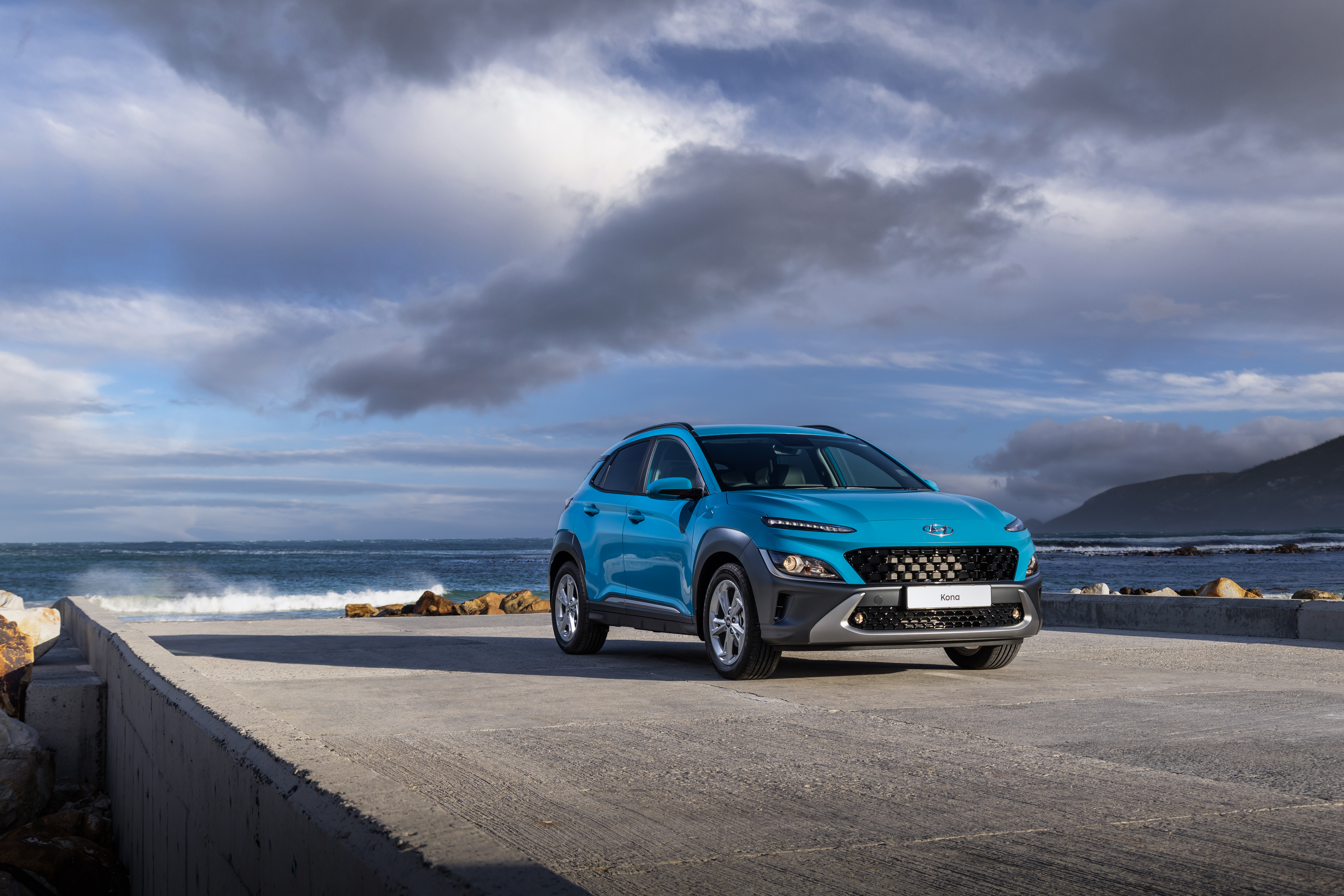 Blue 2021 Hyundai Kona SUV by the ocean HD Wallpaper