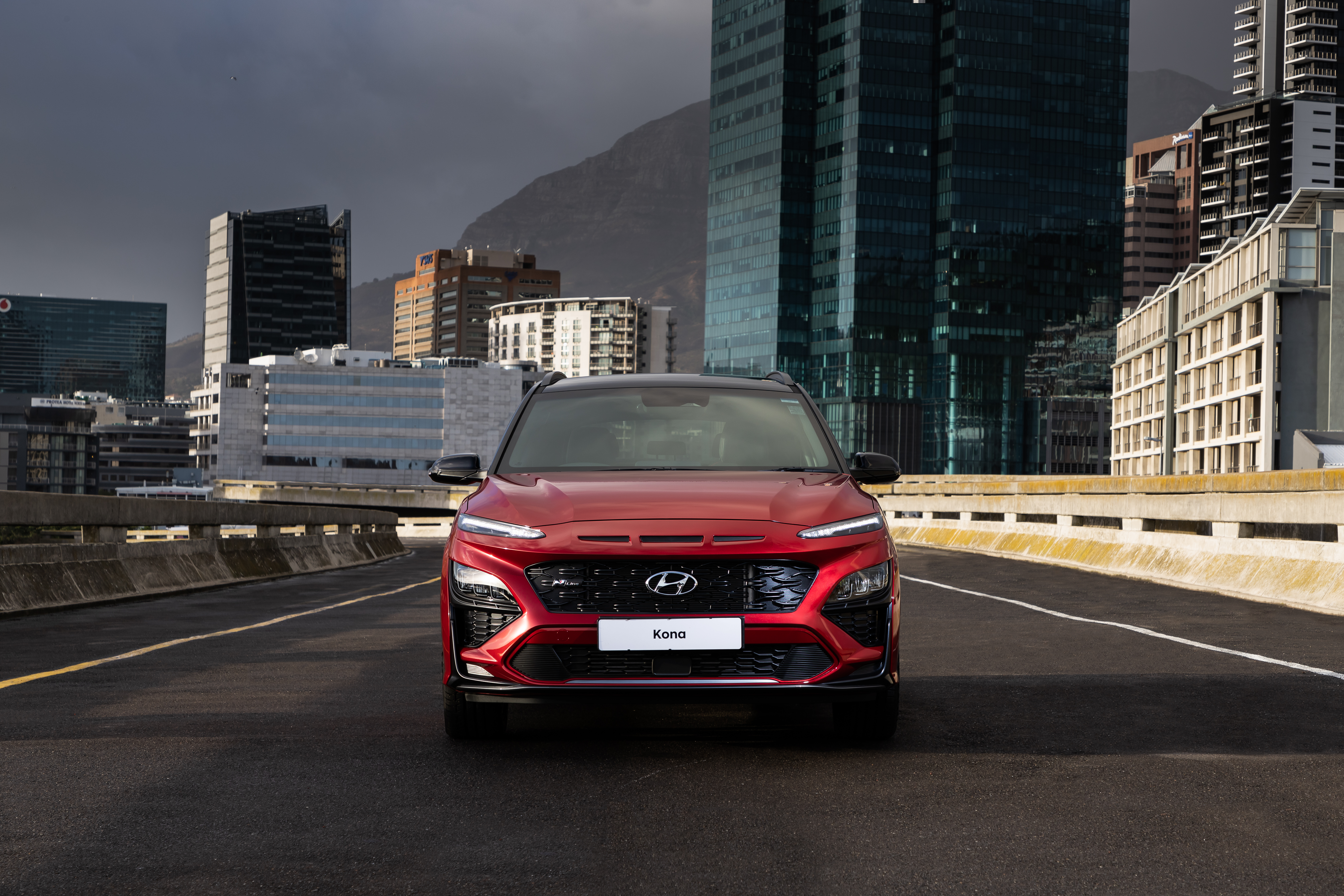 Red 2021 Hyundai Kona N Line SUV in city HD Wallpaper
