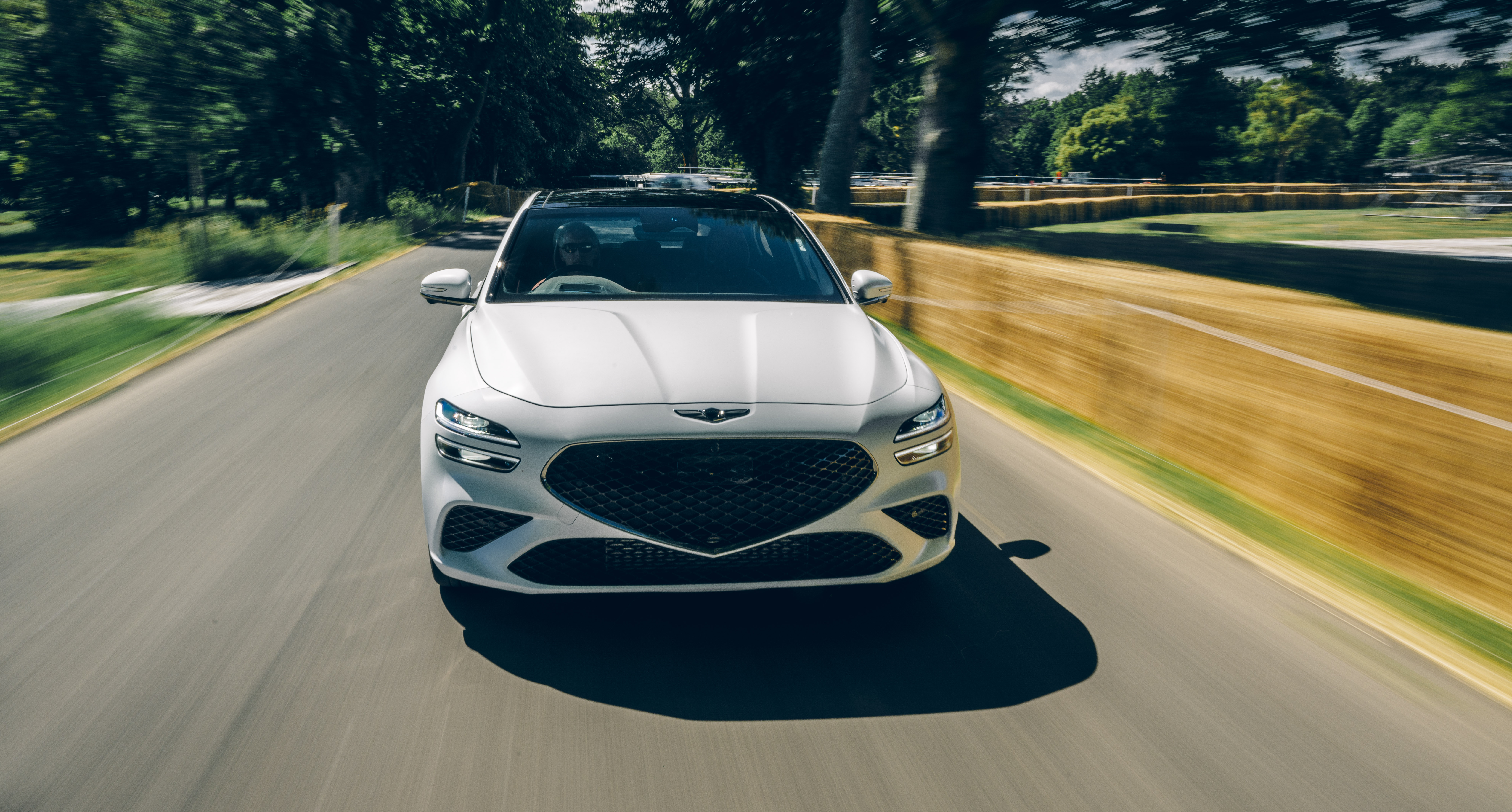 White 2021 Genesis G70 Shooting Brake driving on road HD Wallpaper