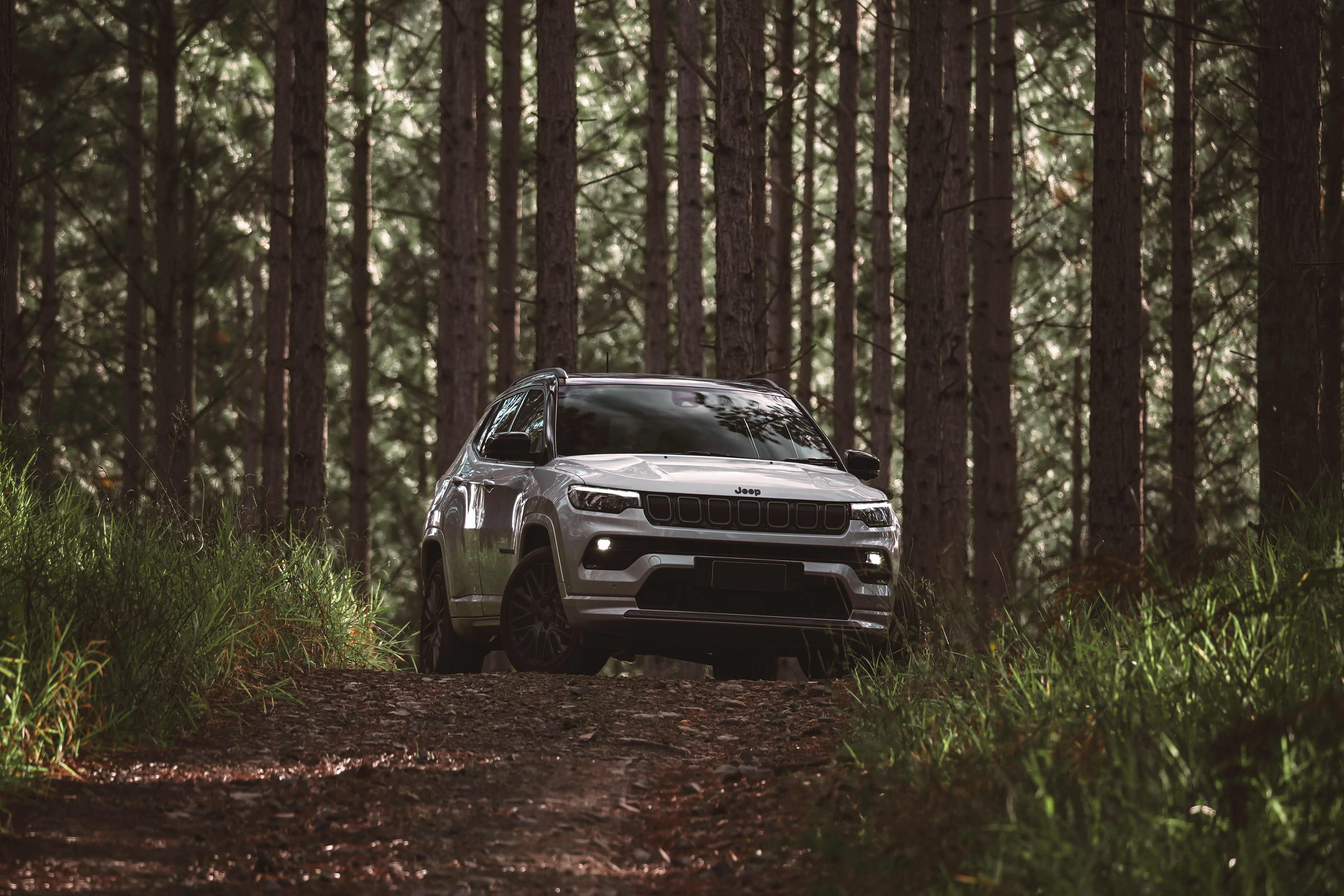 2021 Jeep Compass S AU-spec SUV in forest HD Wallpaper