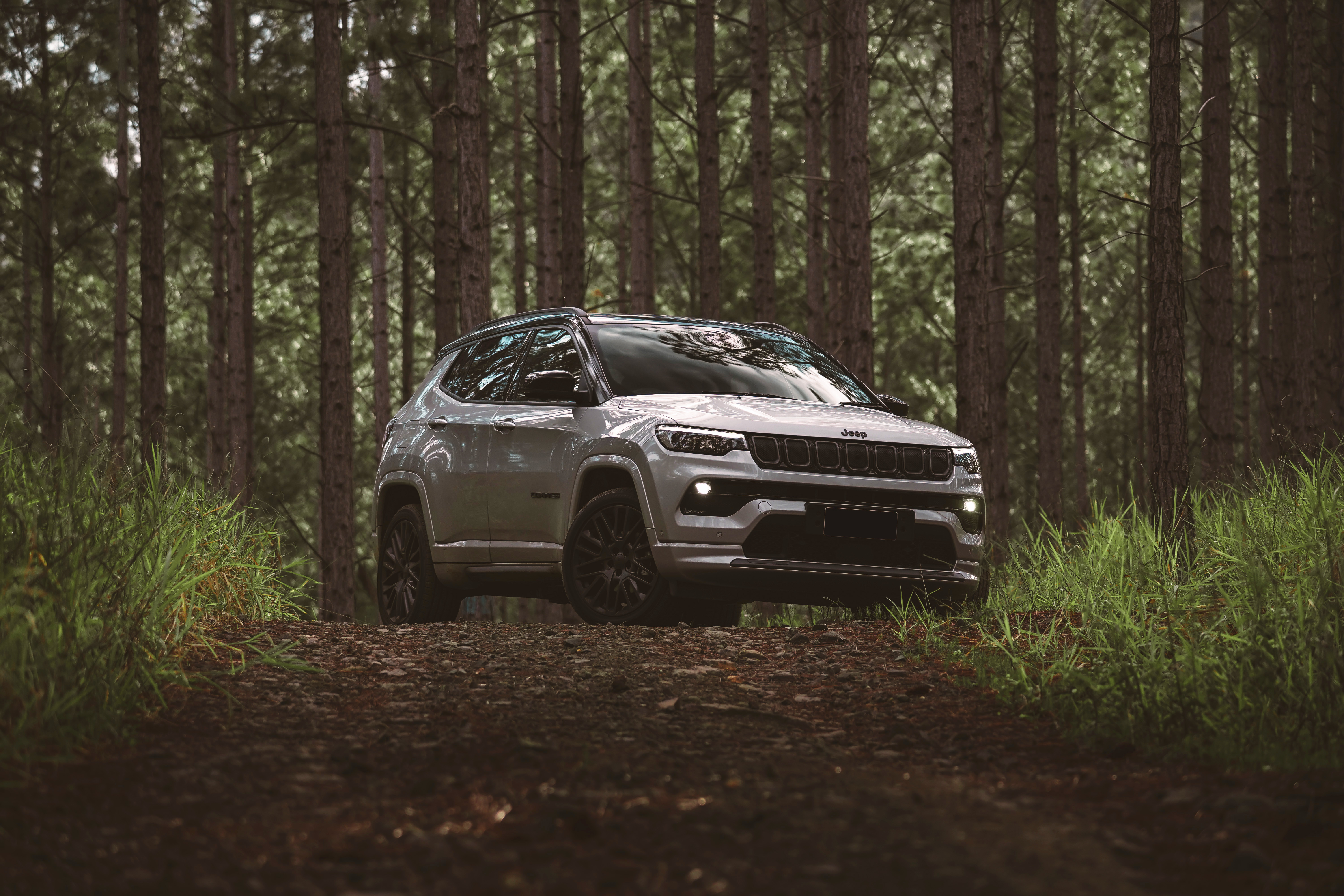 2021 Jeep Compass S AU-spec SUV in forest HD Wallpaper
