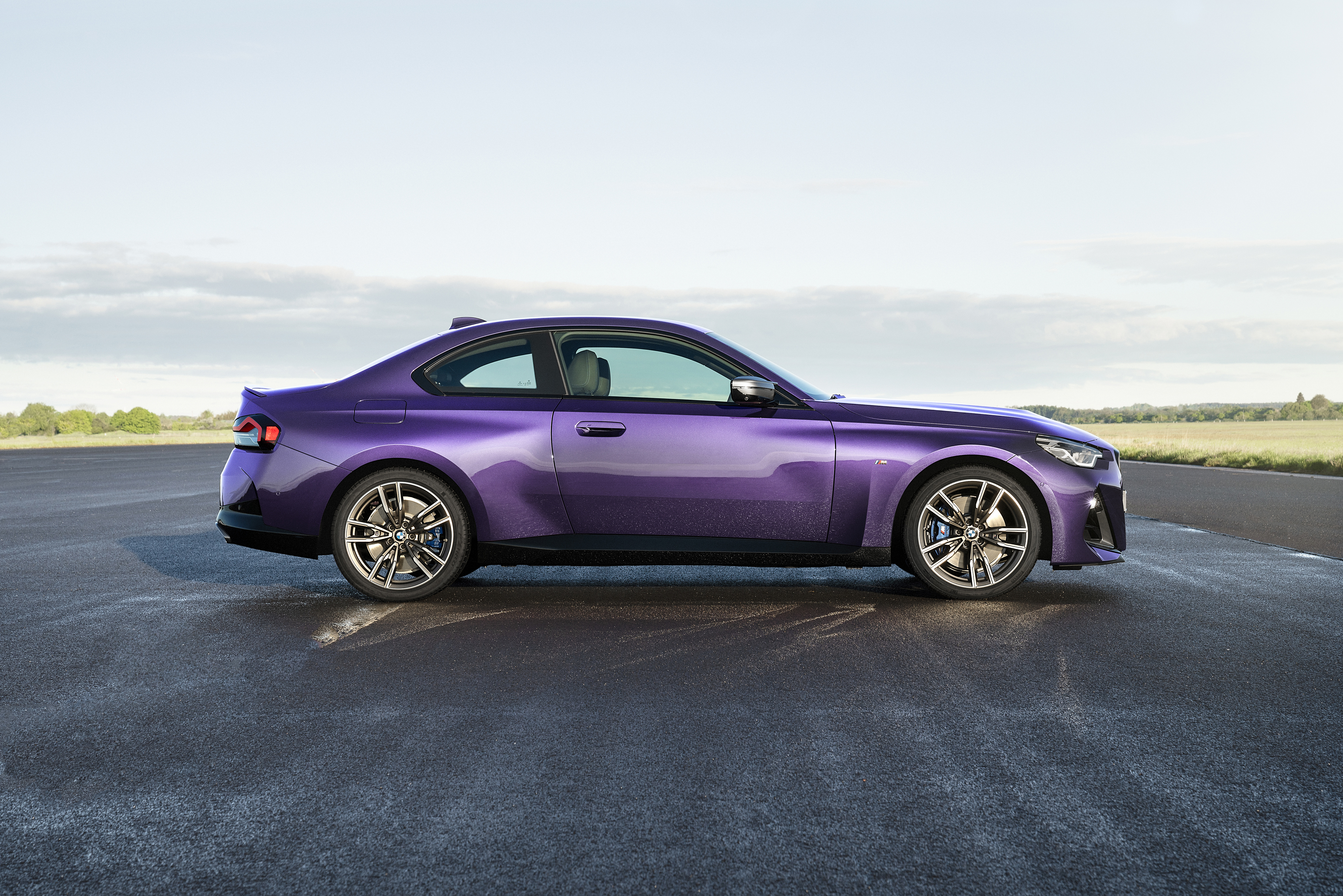 Purple BMW M240i xDrive Coupé on asphalt HD Wallpaper
