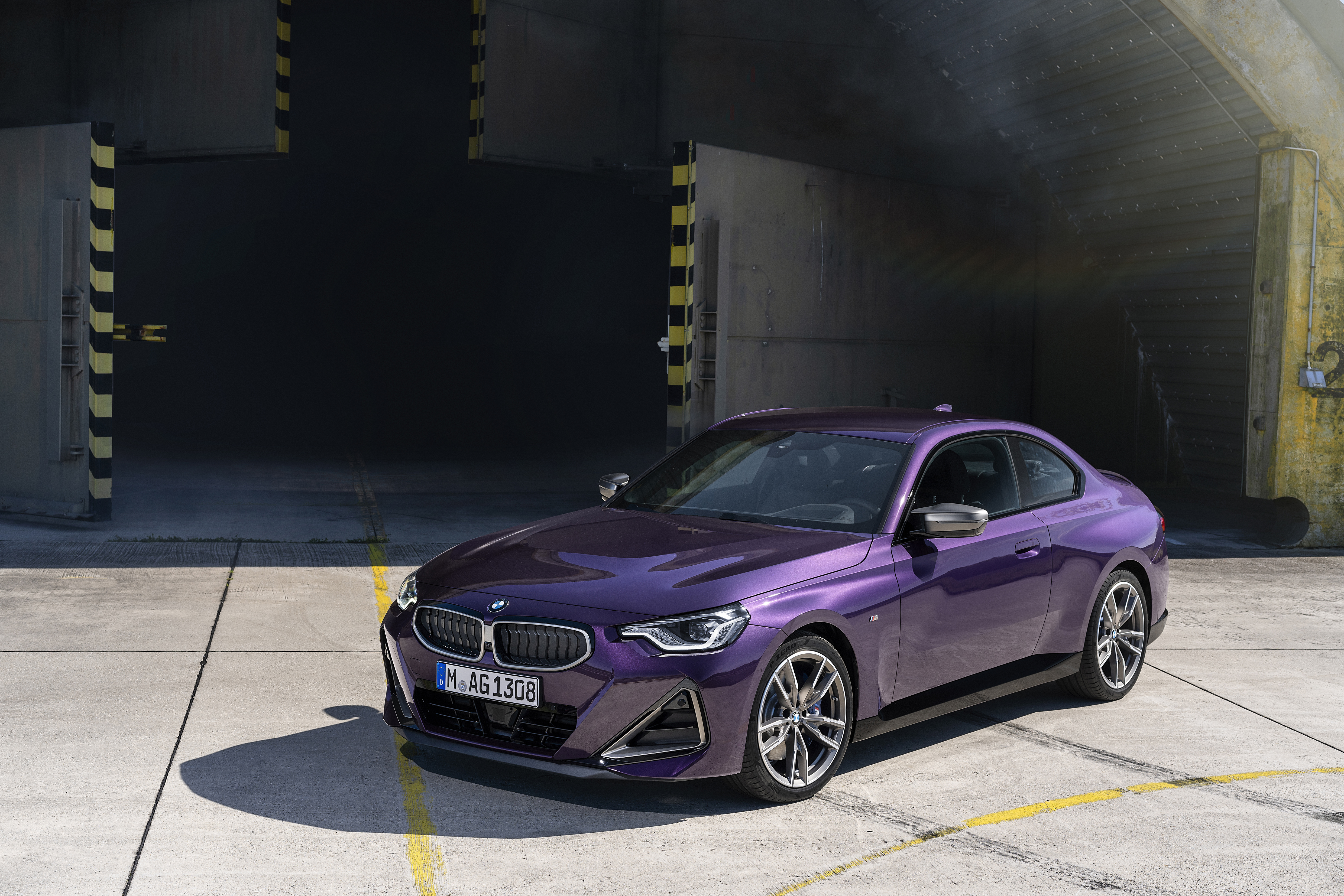 Purple BMW M240i xDrive Coupé parked outside HD Wallpaper