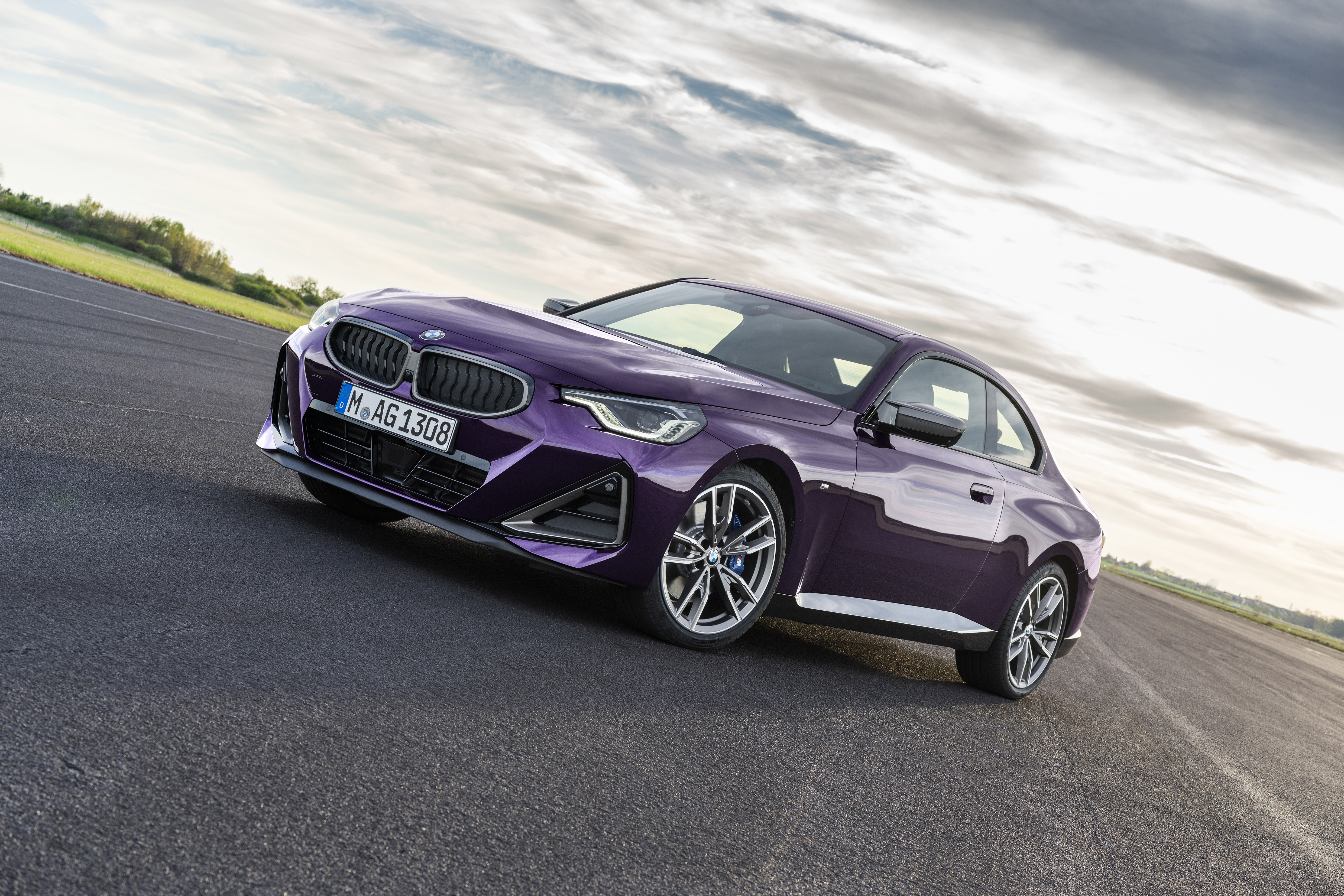 Purple BMW M240i xDrive Coupé on asphalt HD Wallpaper