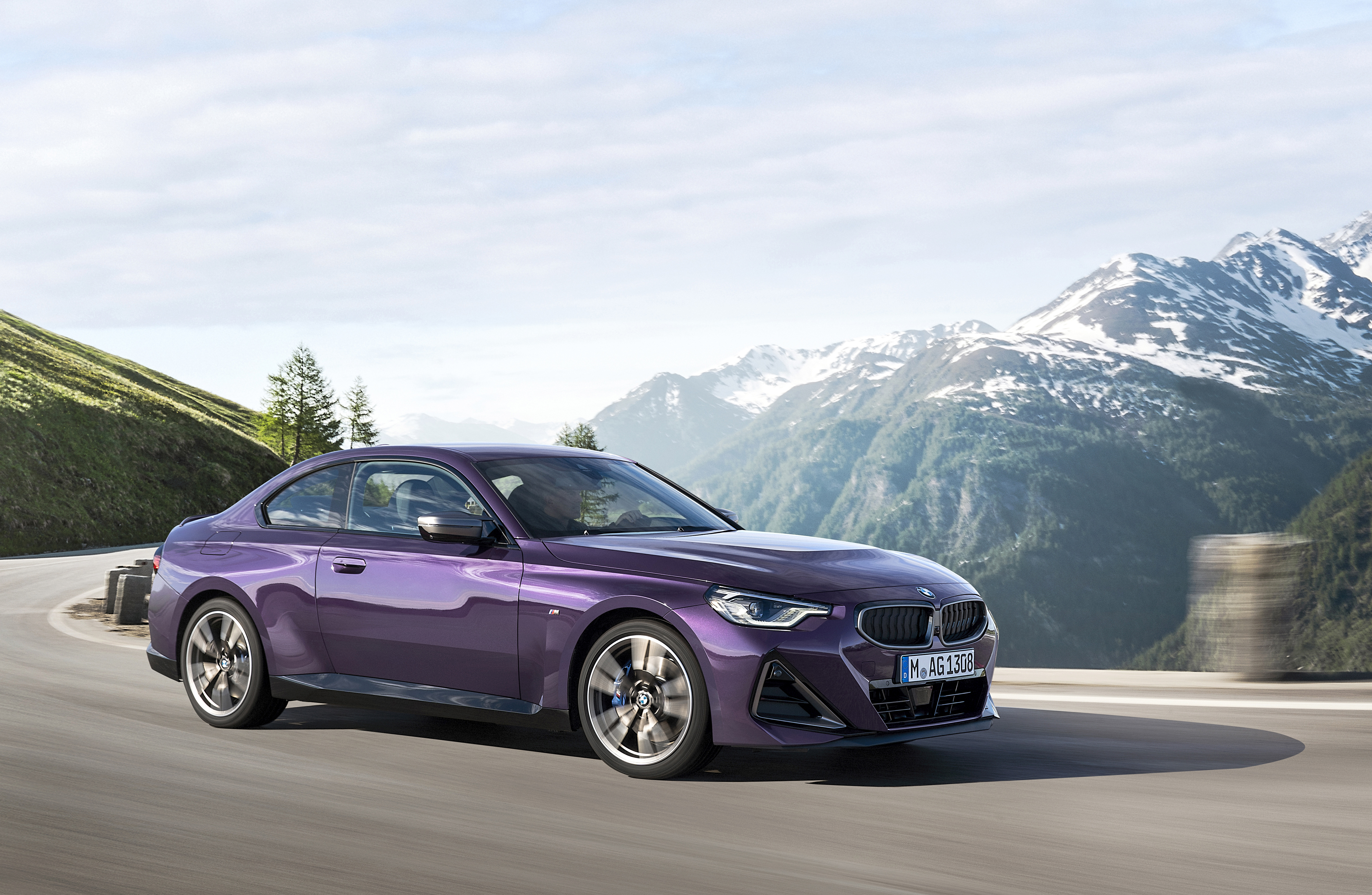 Purple BMW M240i xDrive Coupé on mountain road HD Wallpaper