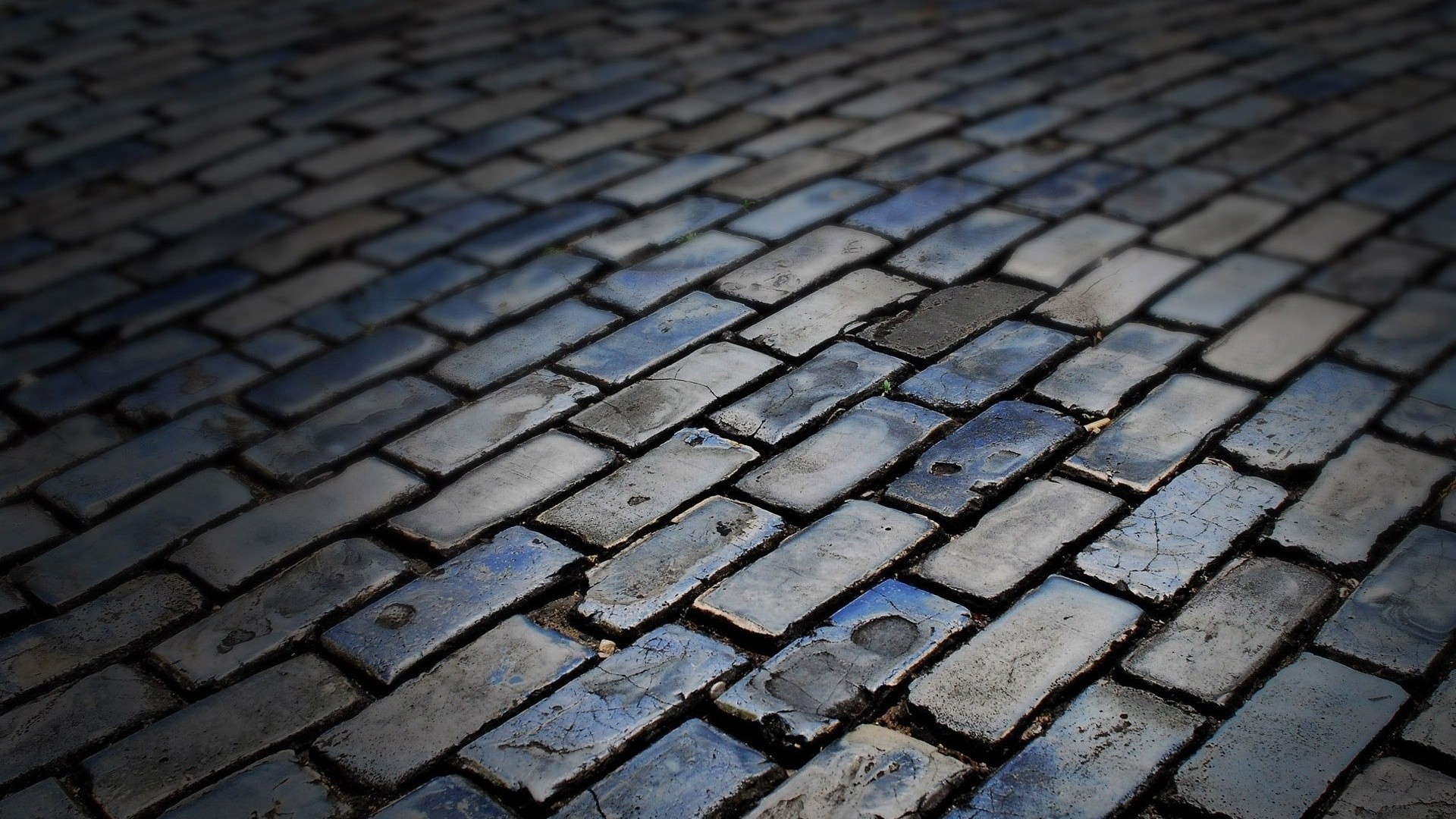 Cobblestone road texture with blue and gray bricks HD Wallpaper