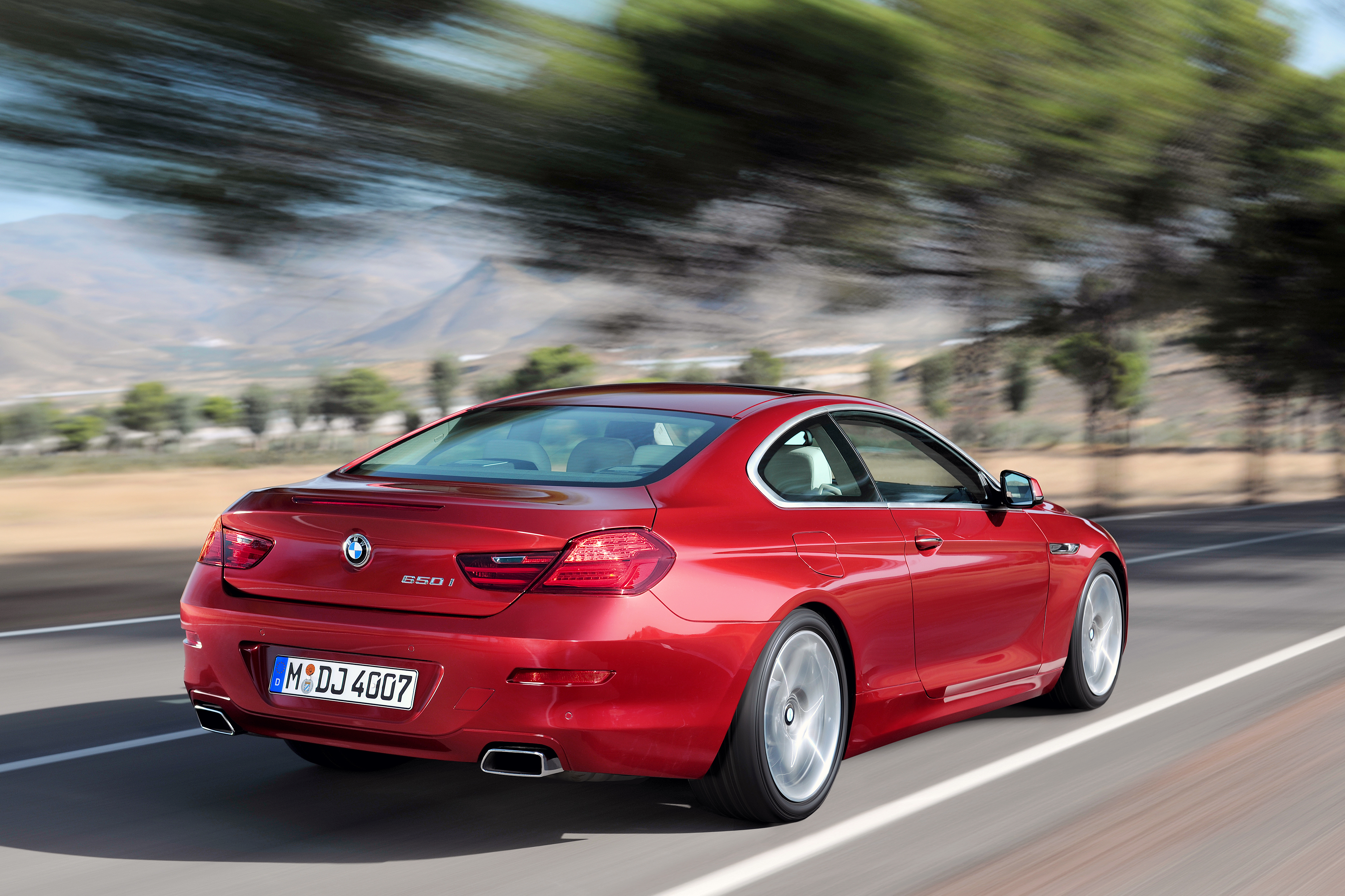 Red BMW 650i Coupe Driving HD Wallpaper