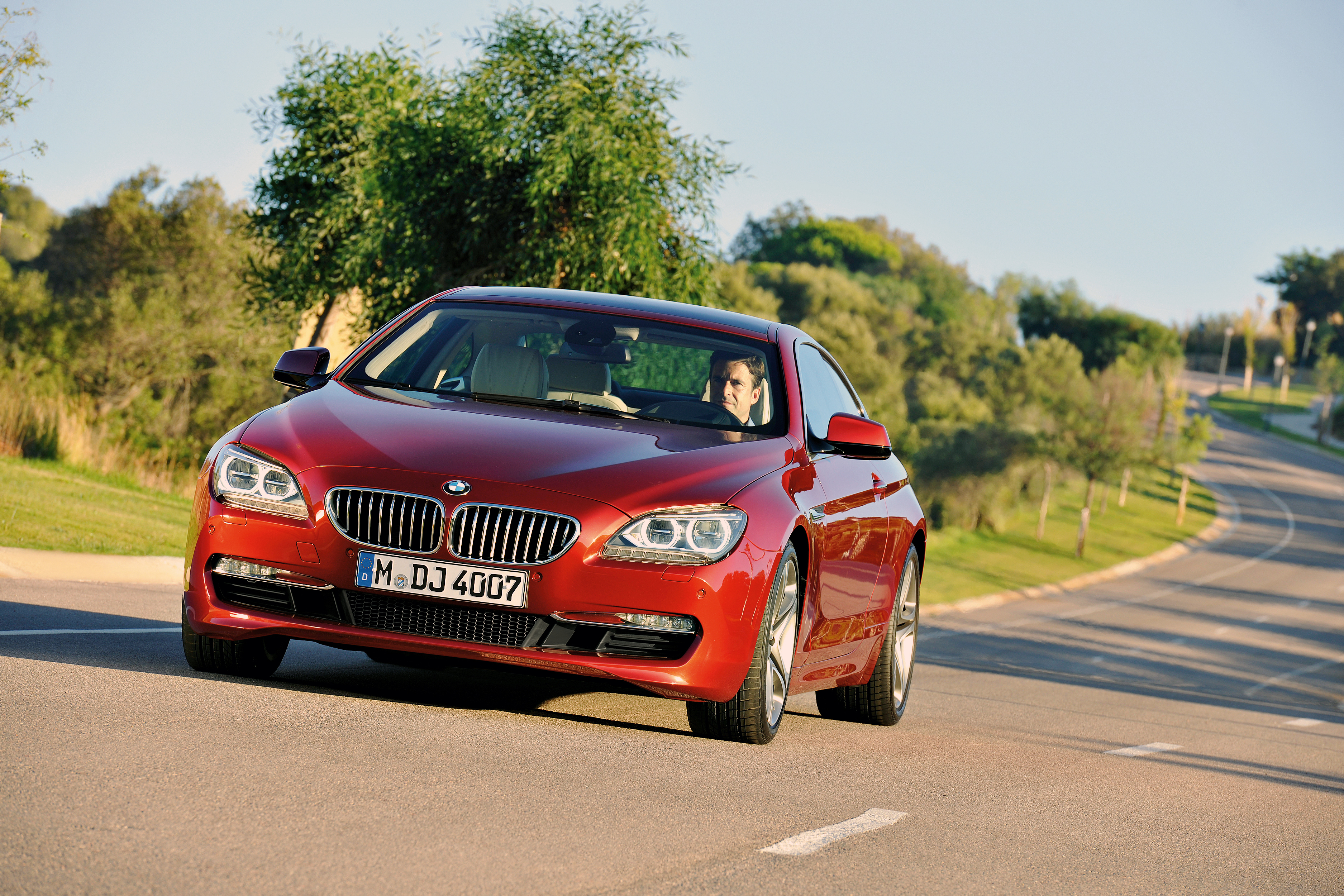 Red BMW 650i Coupe on a Road HD Wallpaper